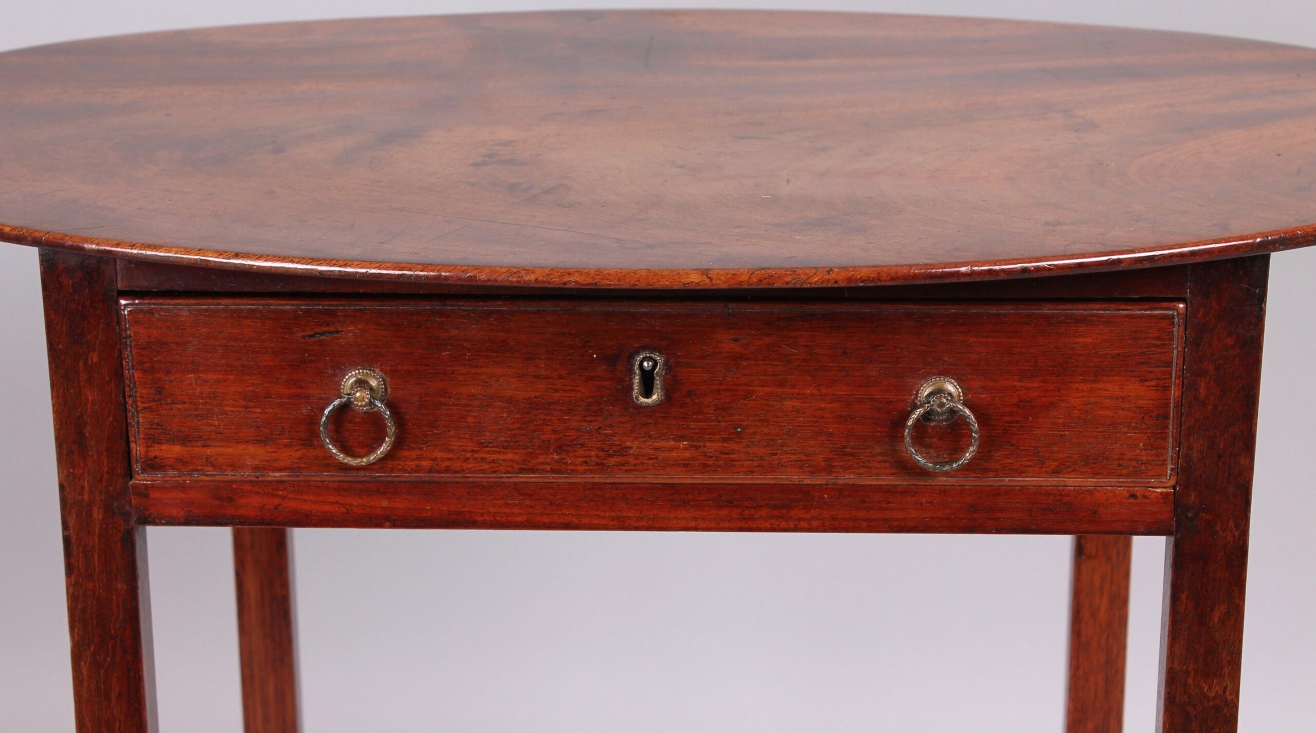 Unusual George III period mahogany occasional table