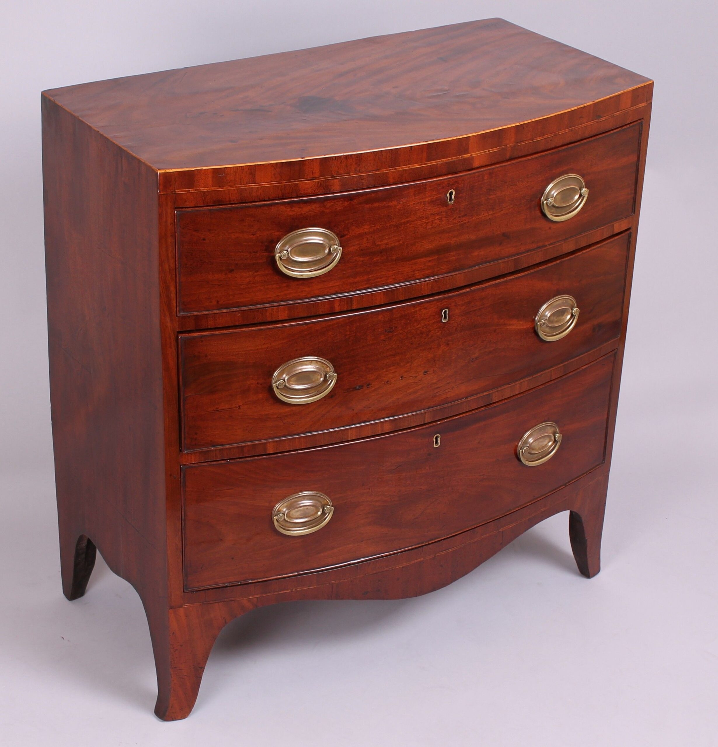 Small early 19th century mahogany bow-fronted chest-of-drawers