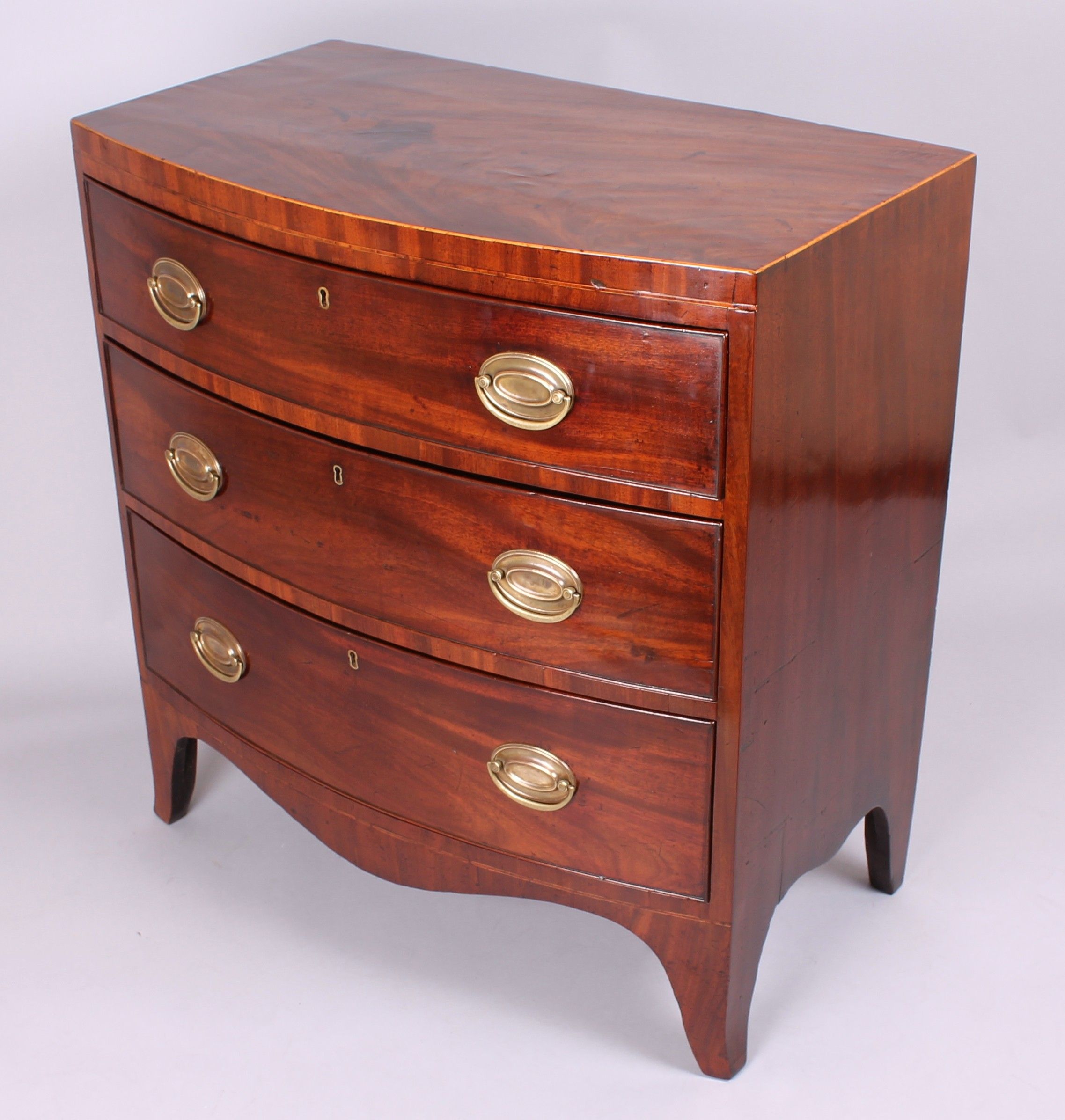 Small early 19th century mahogany bow-fronted chest-of-drawers