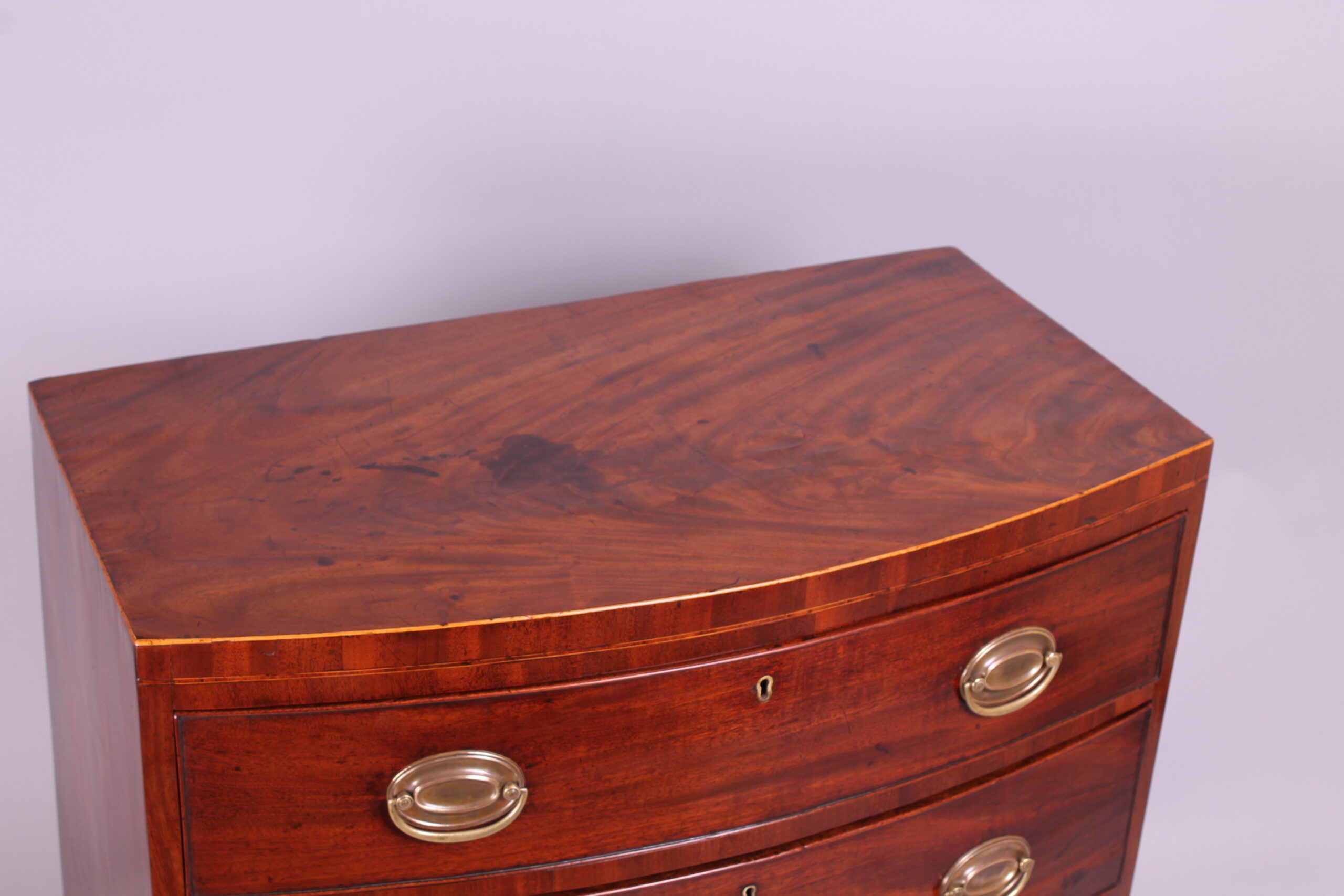 Small early 19th century mahogany bow-fronted chest-of-drawers