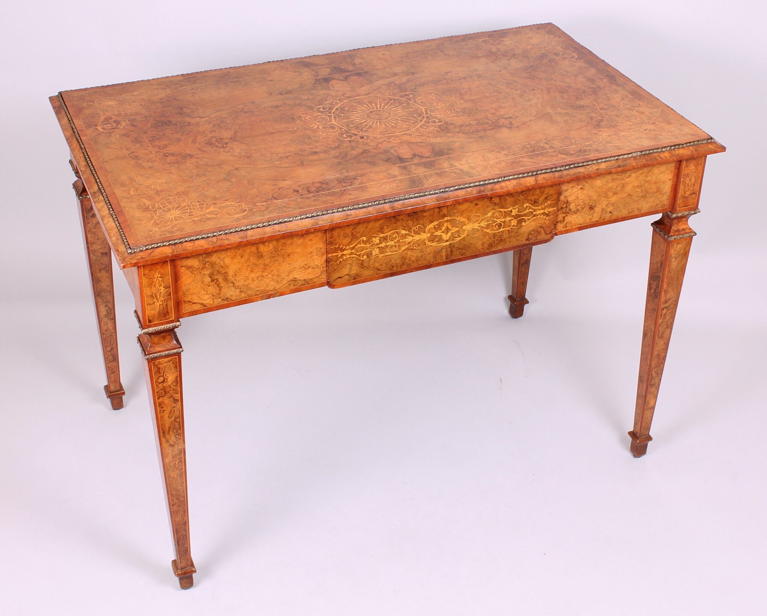 High quality mid nineteenth century burr walnut centre-table in the French manner