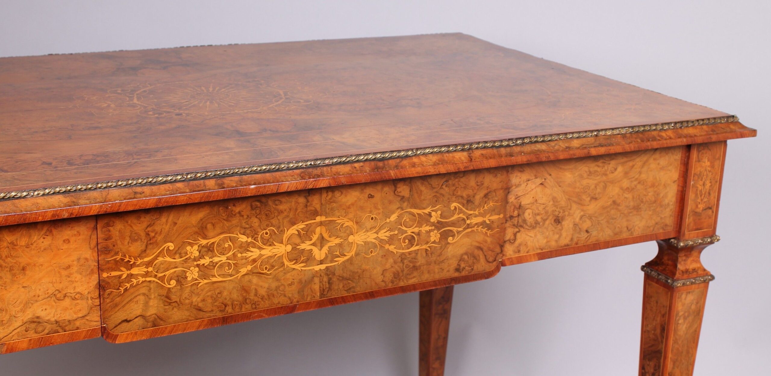 High quality mid nineteenth century burr walnut centre-table in the French manner