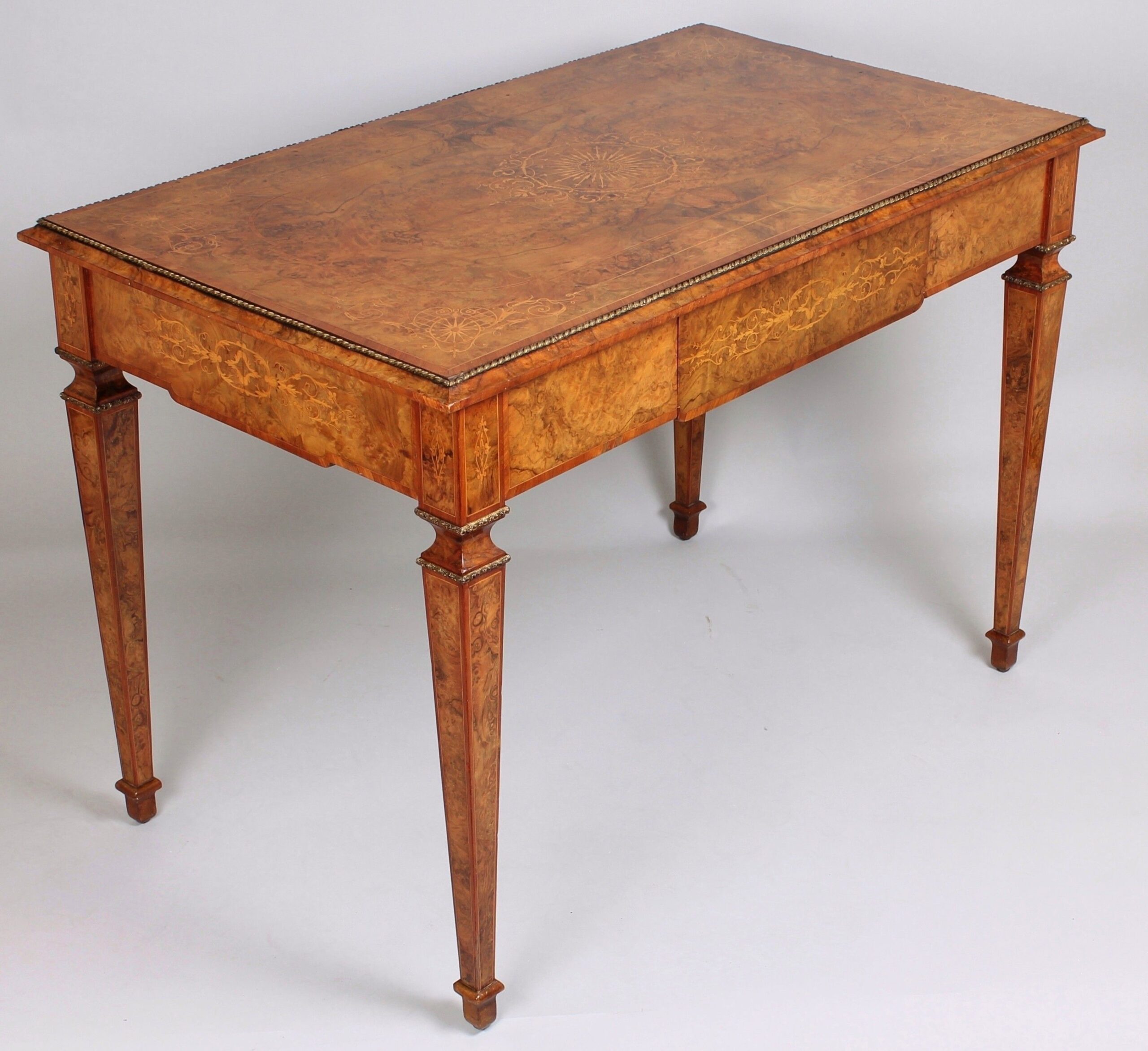 High quality mid nineteenth century burr walnut centre-table in the French manner