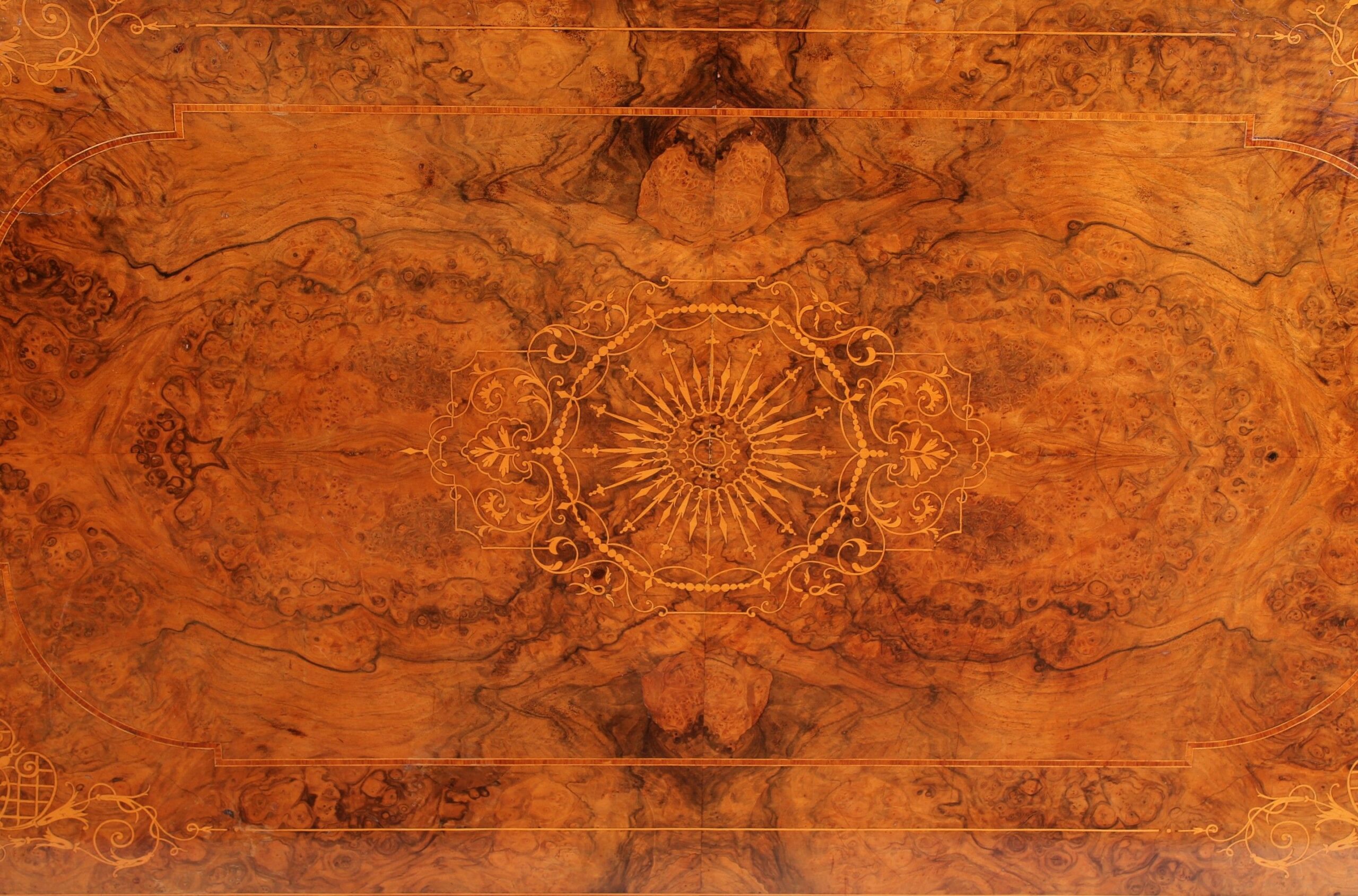 High quality mid nineteenth century burr walnut centre-table in the French manner