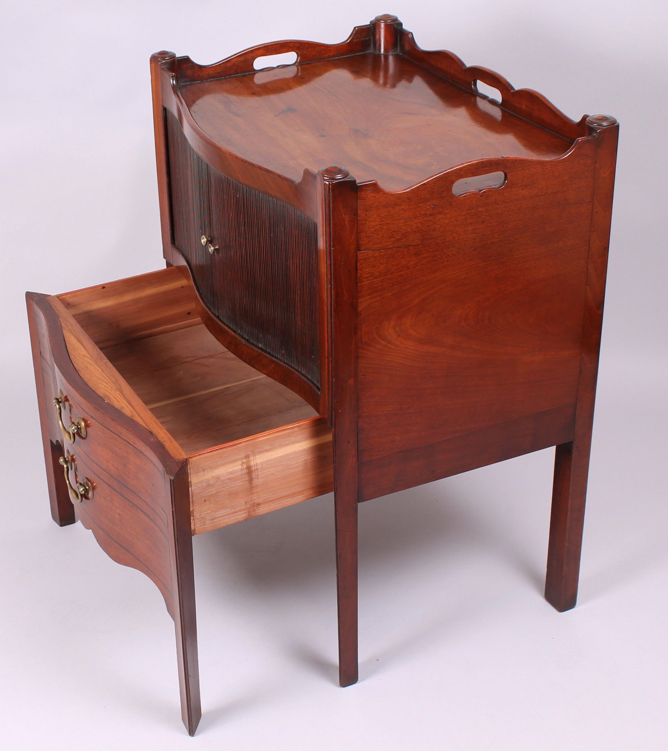 Rare George III period mahogany serpentine-fronted night-table