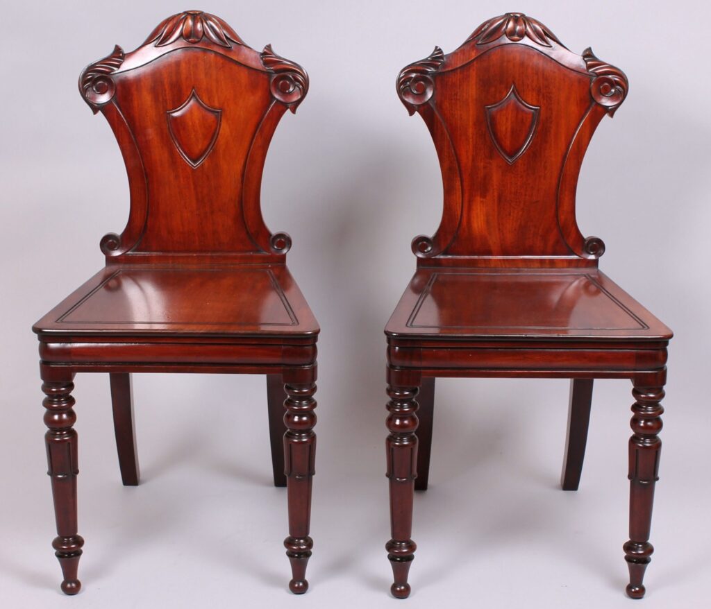 Pair of early 19th century mahogany hall-chairs