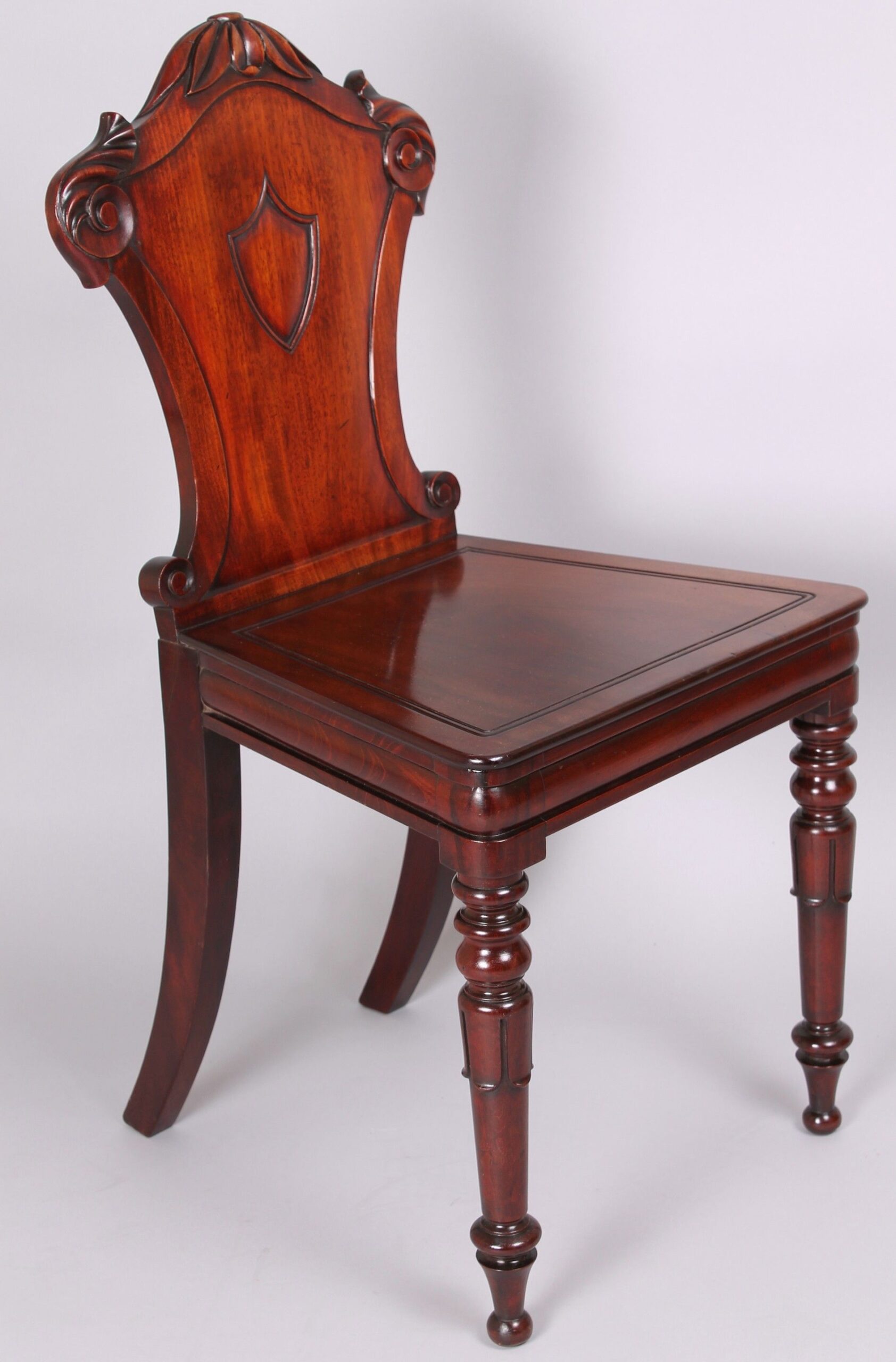 Pair of early 19th century mahogany hall-chairs