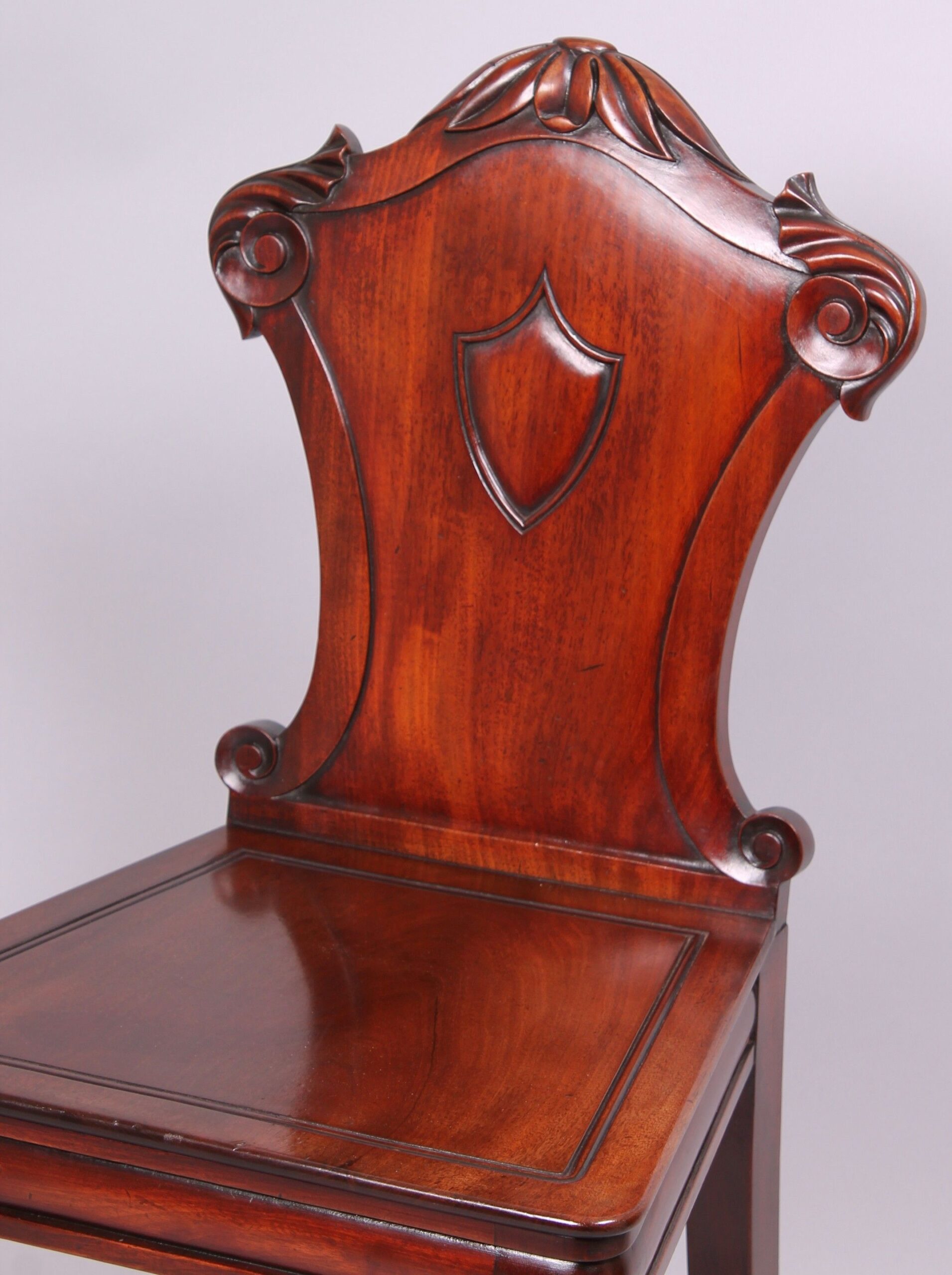 Pair of early 19th century mahogany hall-chairs