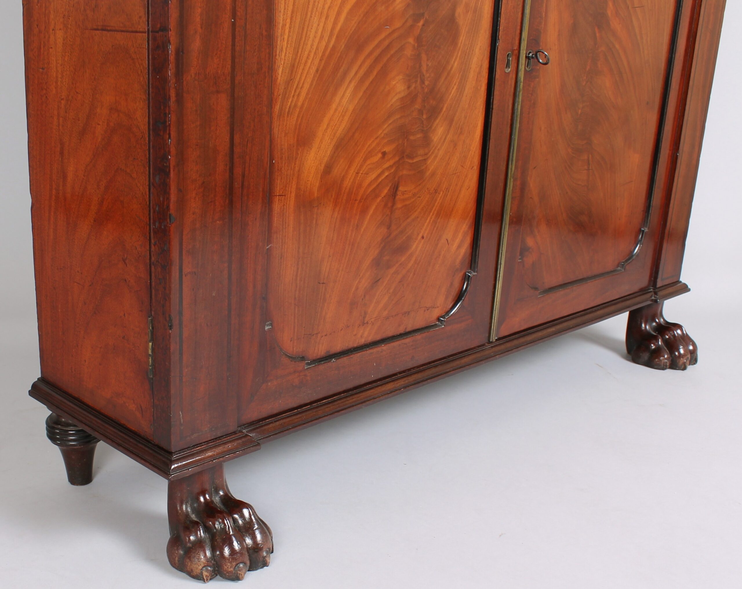 George IV period mahogany side-cabinet of fine quality and unusually shallow proportions