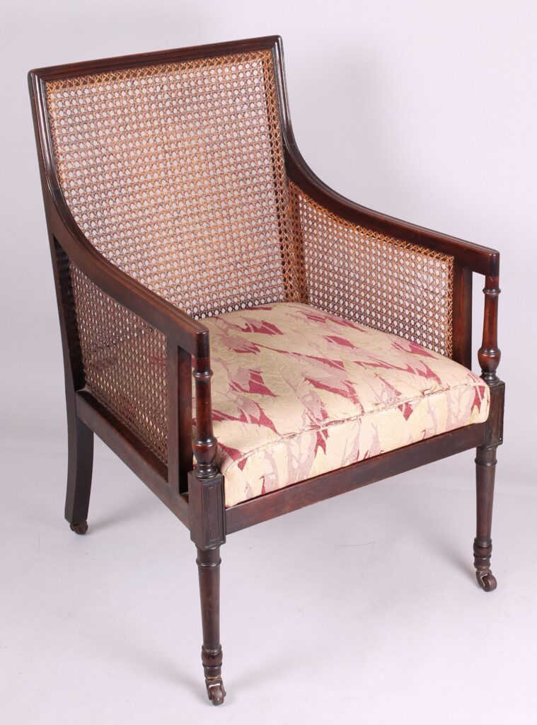 Late nineteenth century Regency Revival mahogany library bergere