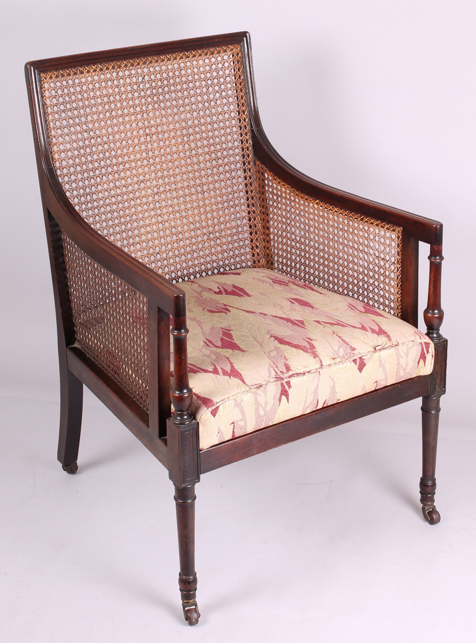 Late nineteenth century Regency Revival mahogany library bergere