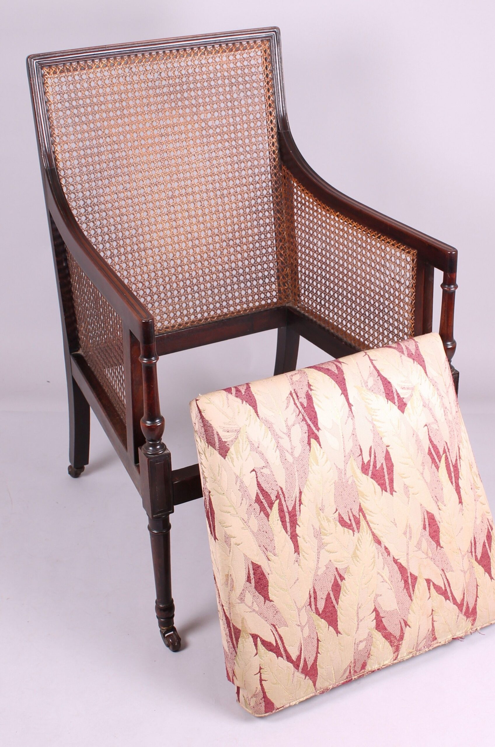 Late nineteenth century Regency Revival mahogany library bergere