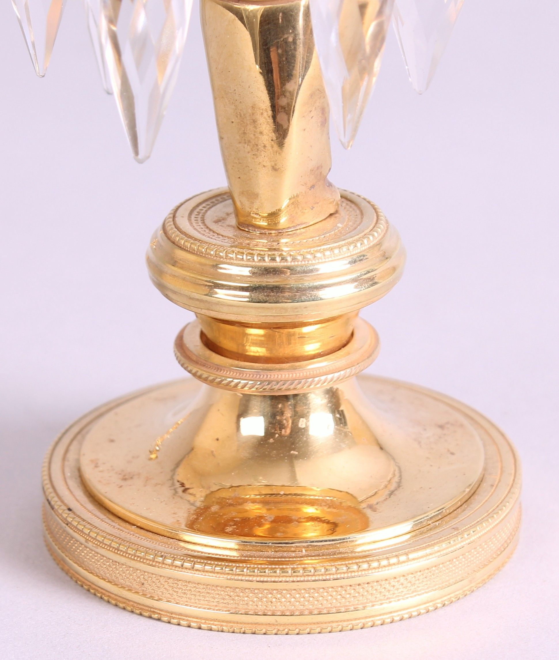 Pair of early 19th century French ormolu candlesticks
