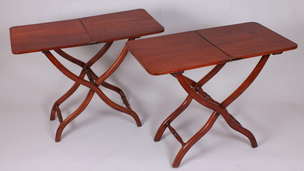 A matched pair of 19th century mahogany ‘coaching’ tables