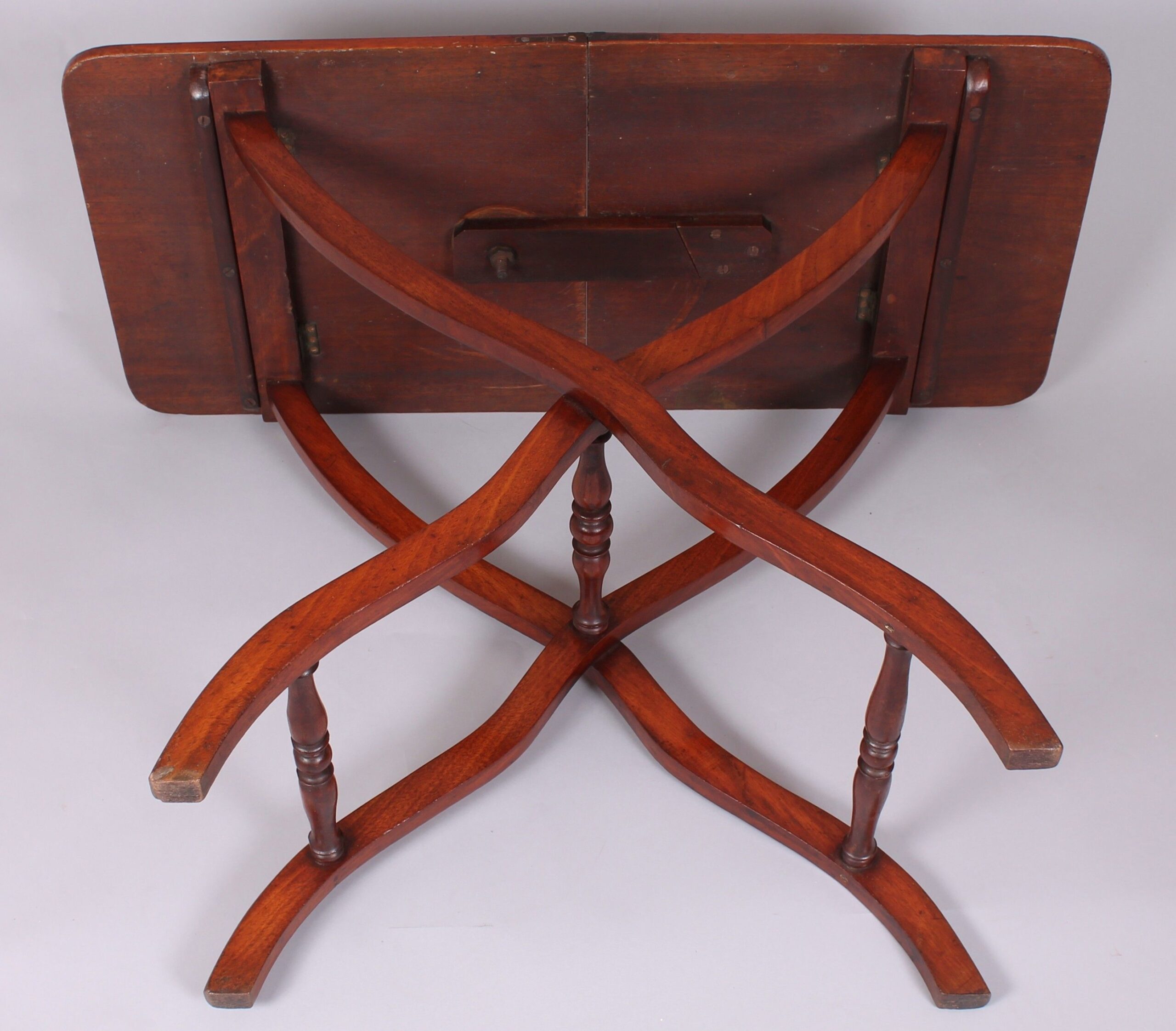 A matched pair of 19th century mahogany ‘coaching’ tables