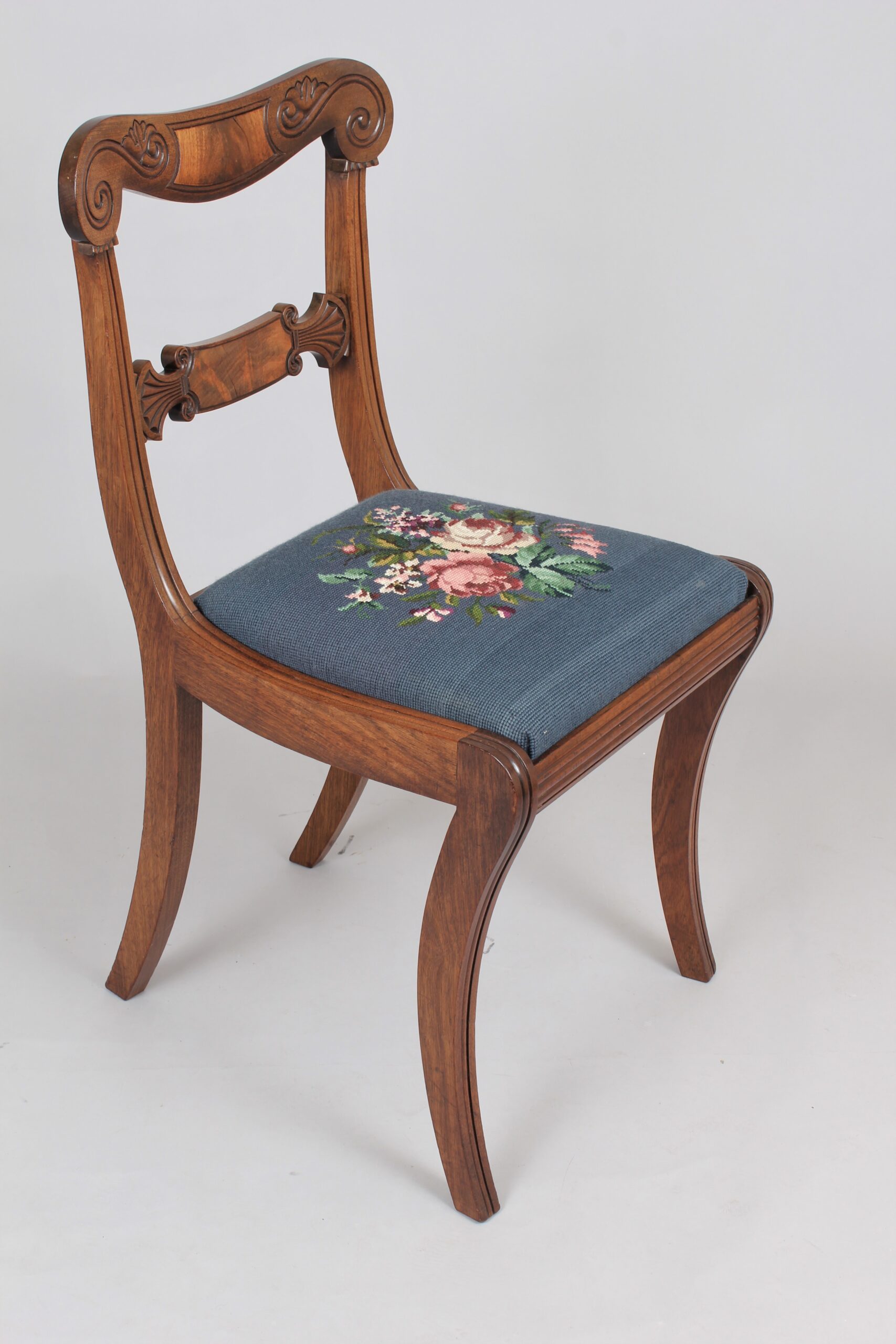Set of six Regency mahogany sabre leg chairs