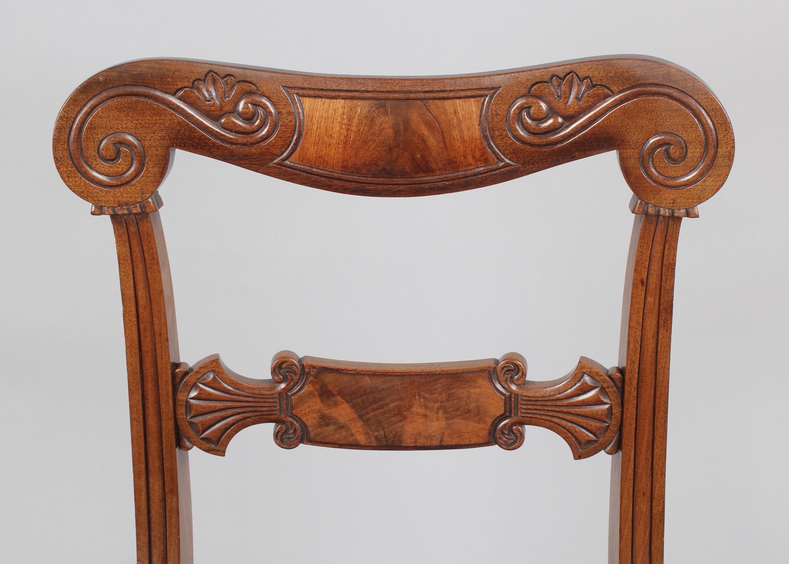 Set of six Regency mahogany sabre leg chairs