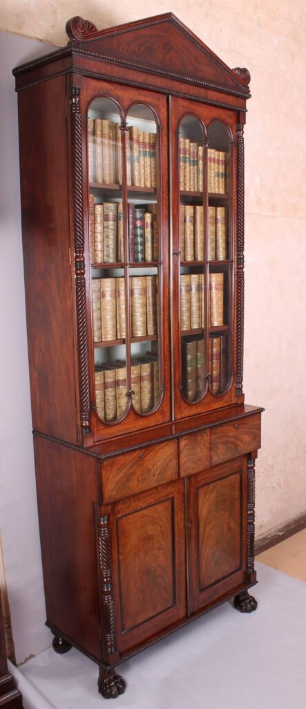 Fine George IV period mahogany bookcase-cabinet of high quality and narrow proportions