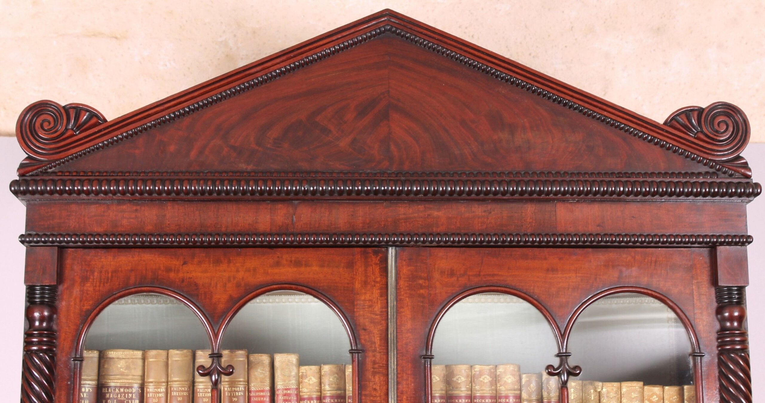 Fine George IV period mahogany bookcase-cabinet of high quality and narrow proportions