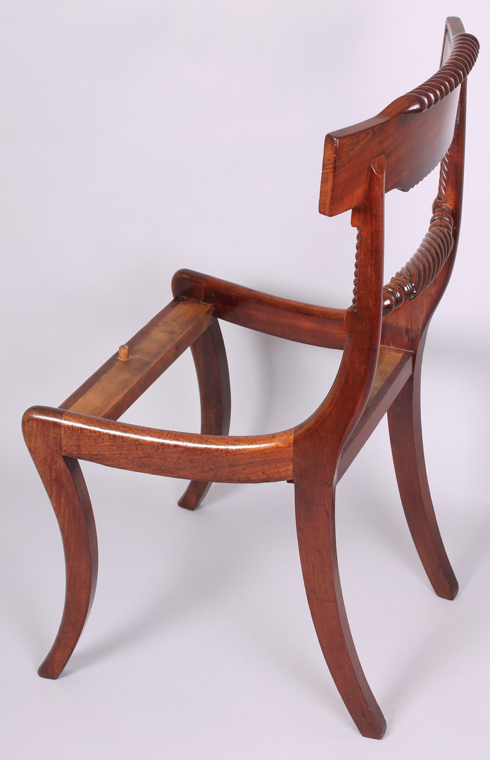 Set of four fine quality Regency period mahogany dining chairs, possibly of Scottish origin