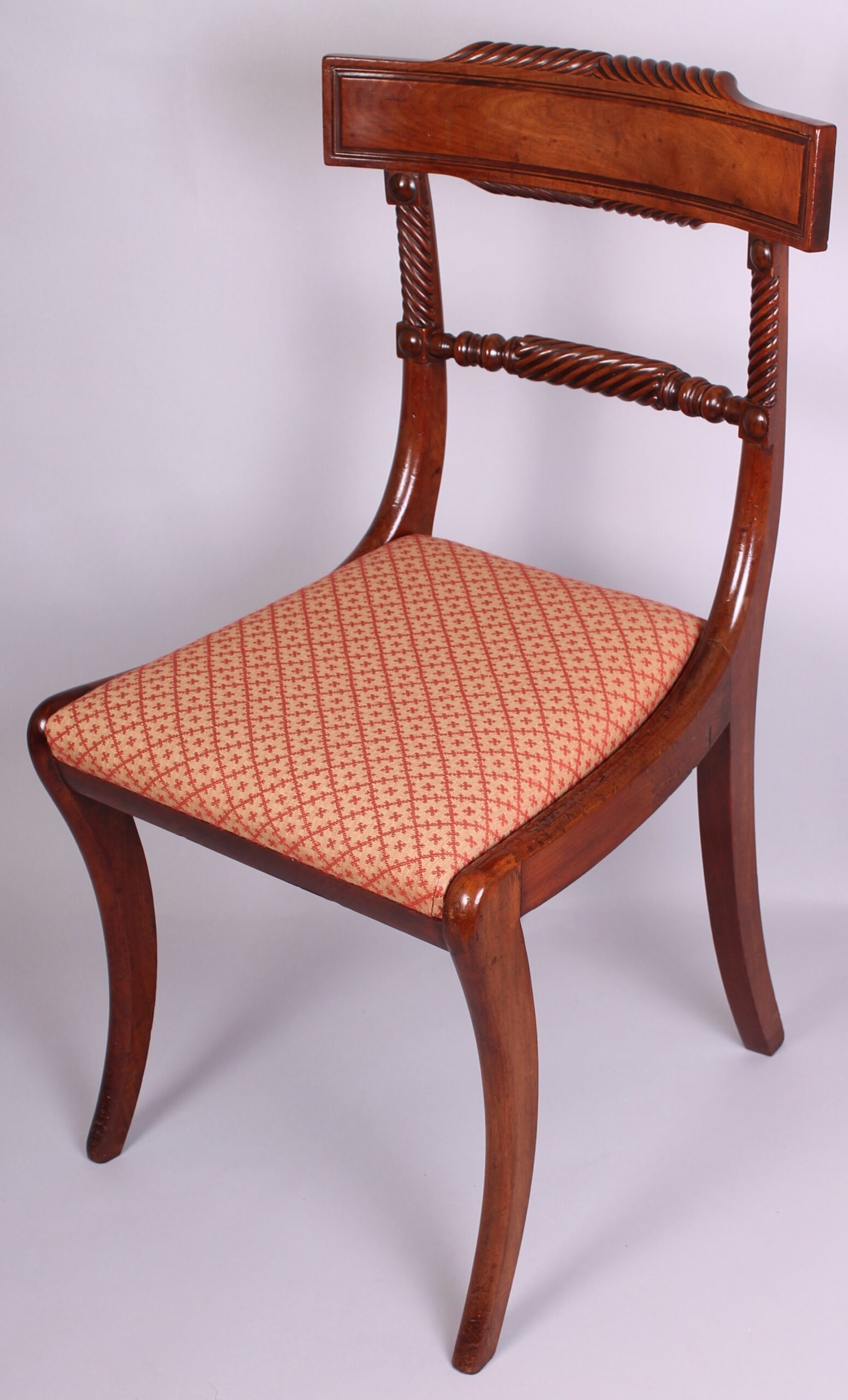 Set of four fine quality Regency period mahogany dining chairs, possibly of Scottish origin