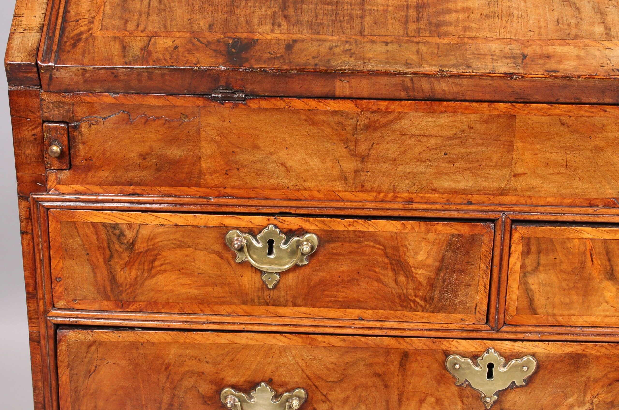 Early eighteenth century walnut bureau of pleasing golden colour and good patia