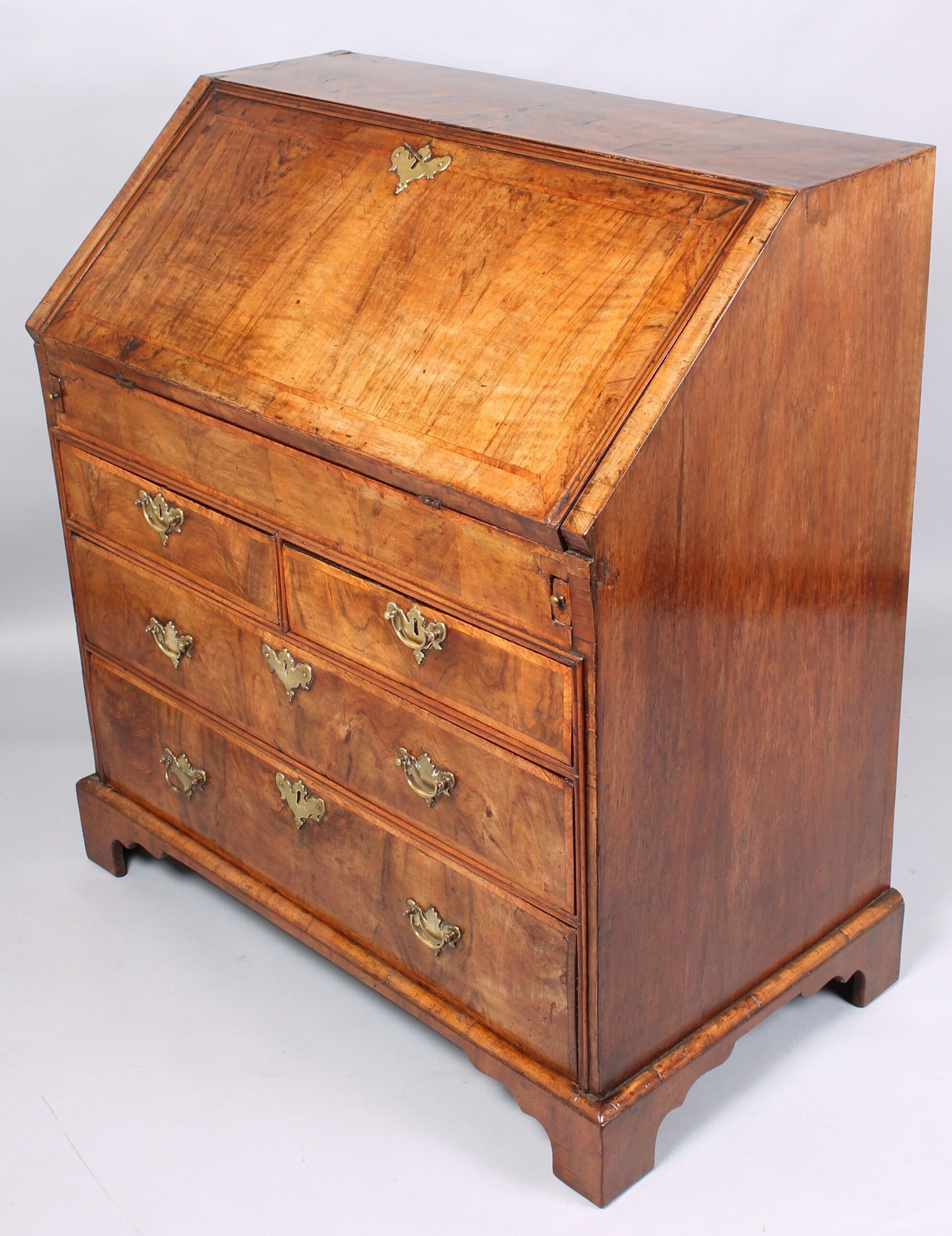 Early eighteenth century walnut bureau of pleasing golden colour and good patia
