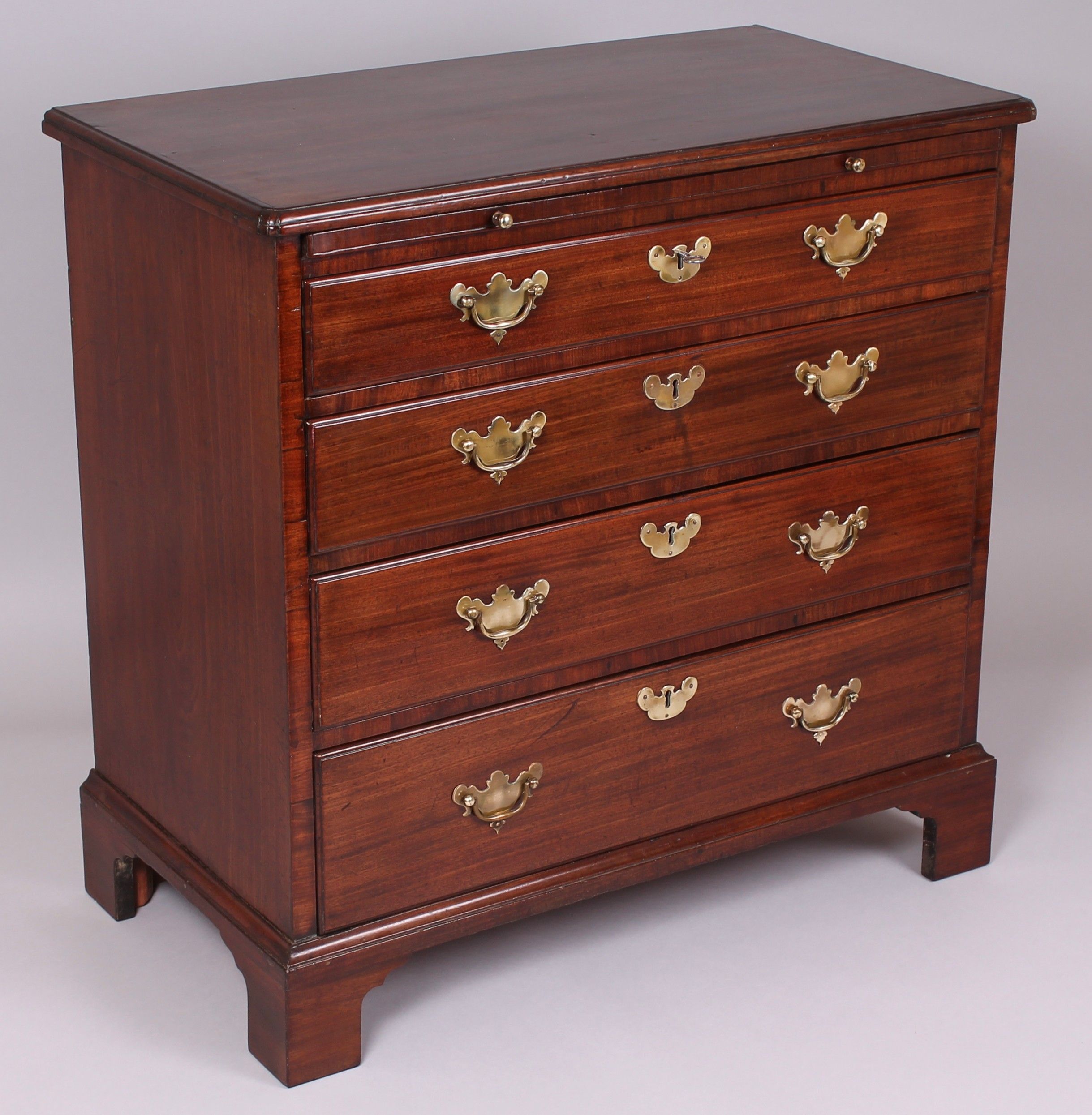A mid eighteenth century mahogany chest-of-drawers of small proportions and rich colour