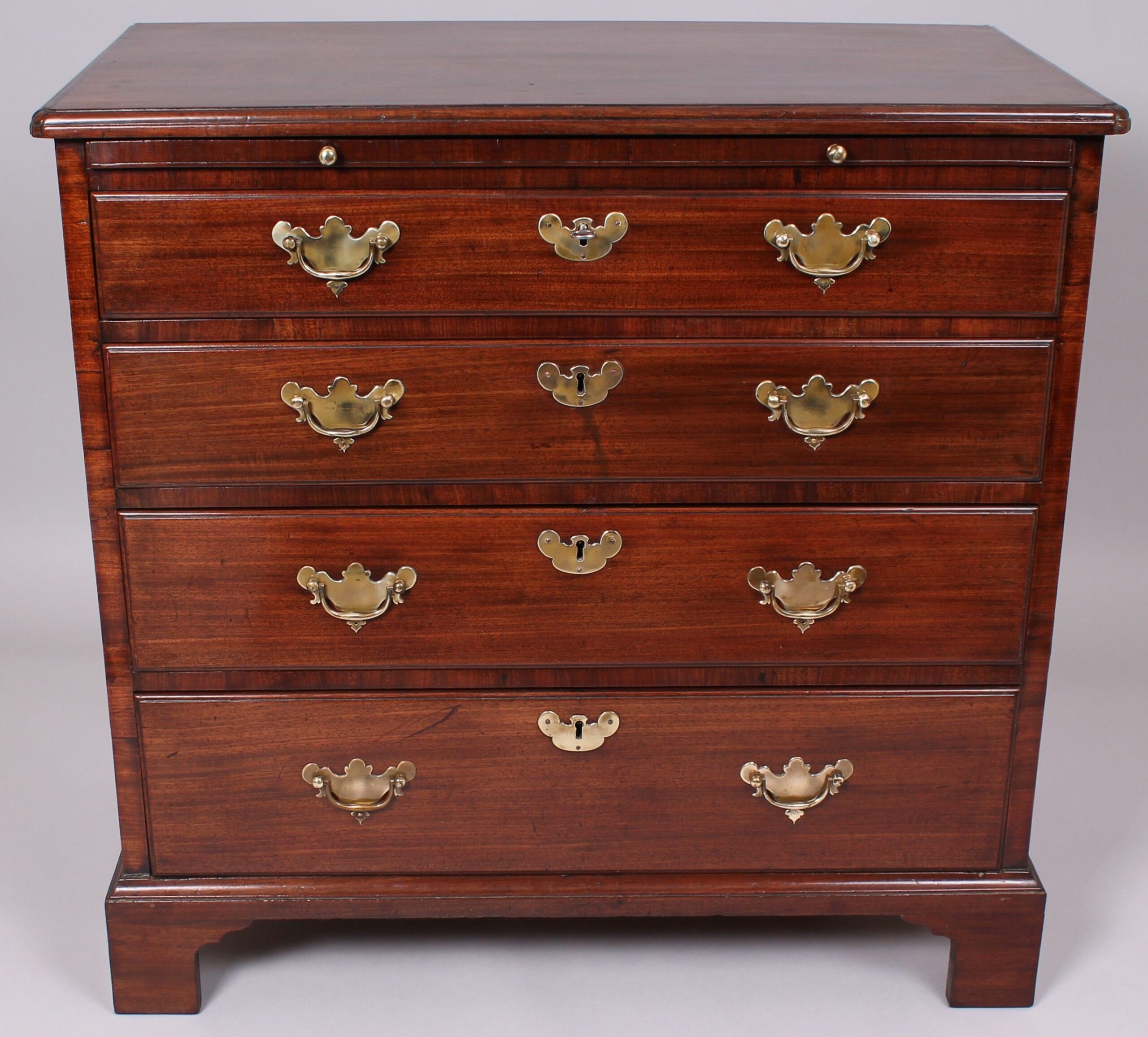 A mid eighteenth century mahogany chest-of-drawers of small proportions and rich colour
