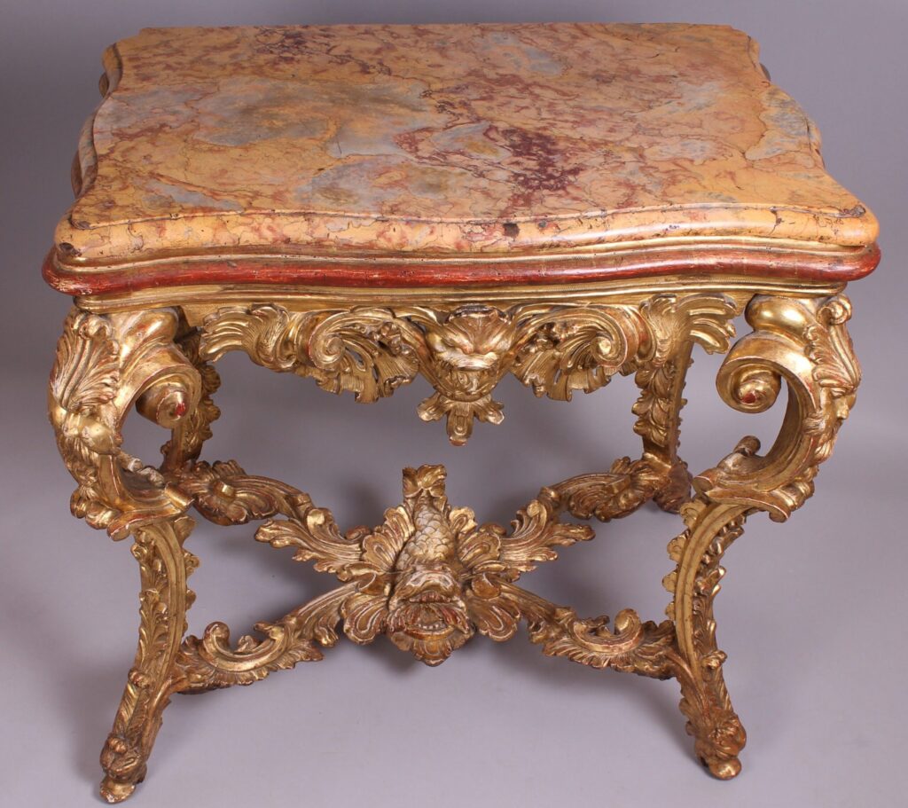Fine and rare mid eighteenth century Italian, probably Venetian, carved and gilt wood side-table