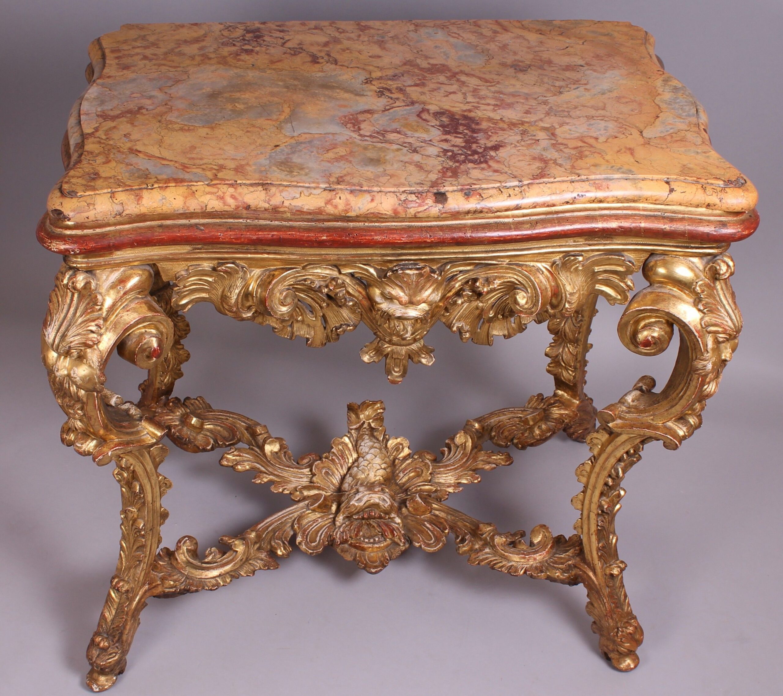 Fine and rare mid eighteenth century Italian, probably Venetian, carved and gilt wood side-table