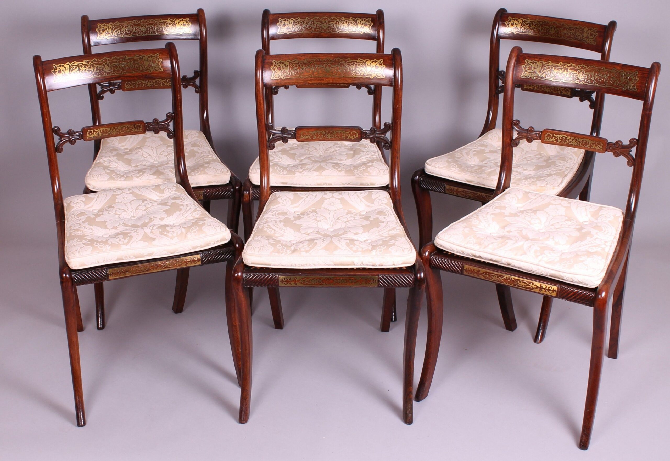 Fine set of six Regency period rosewood and brass in-laid chairs