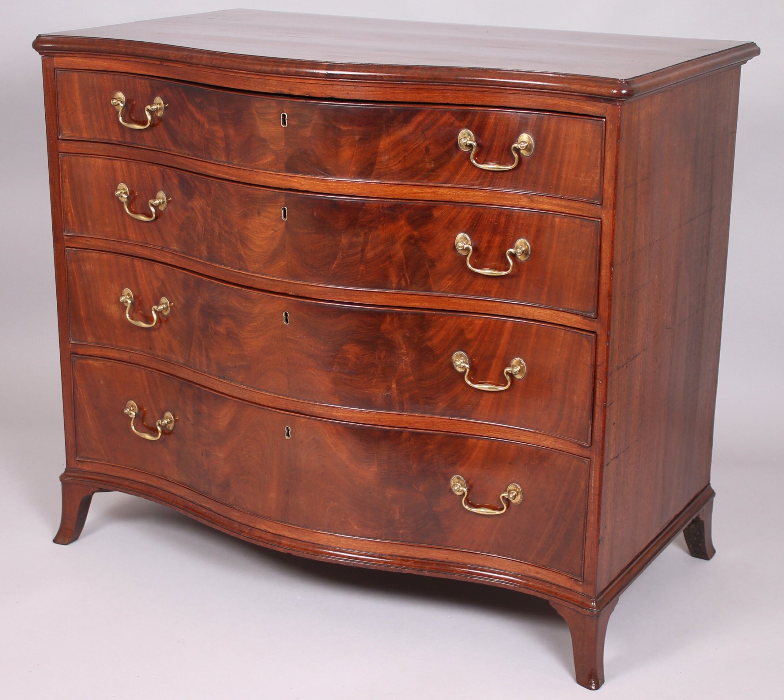 George III period mahogany serpentine-fronted mahogany chest-of-drawers of high quality