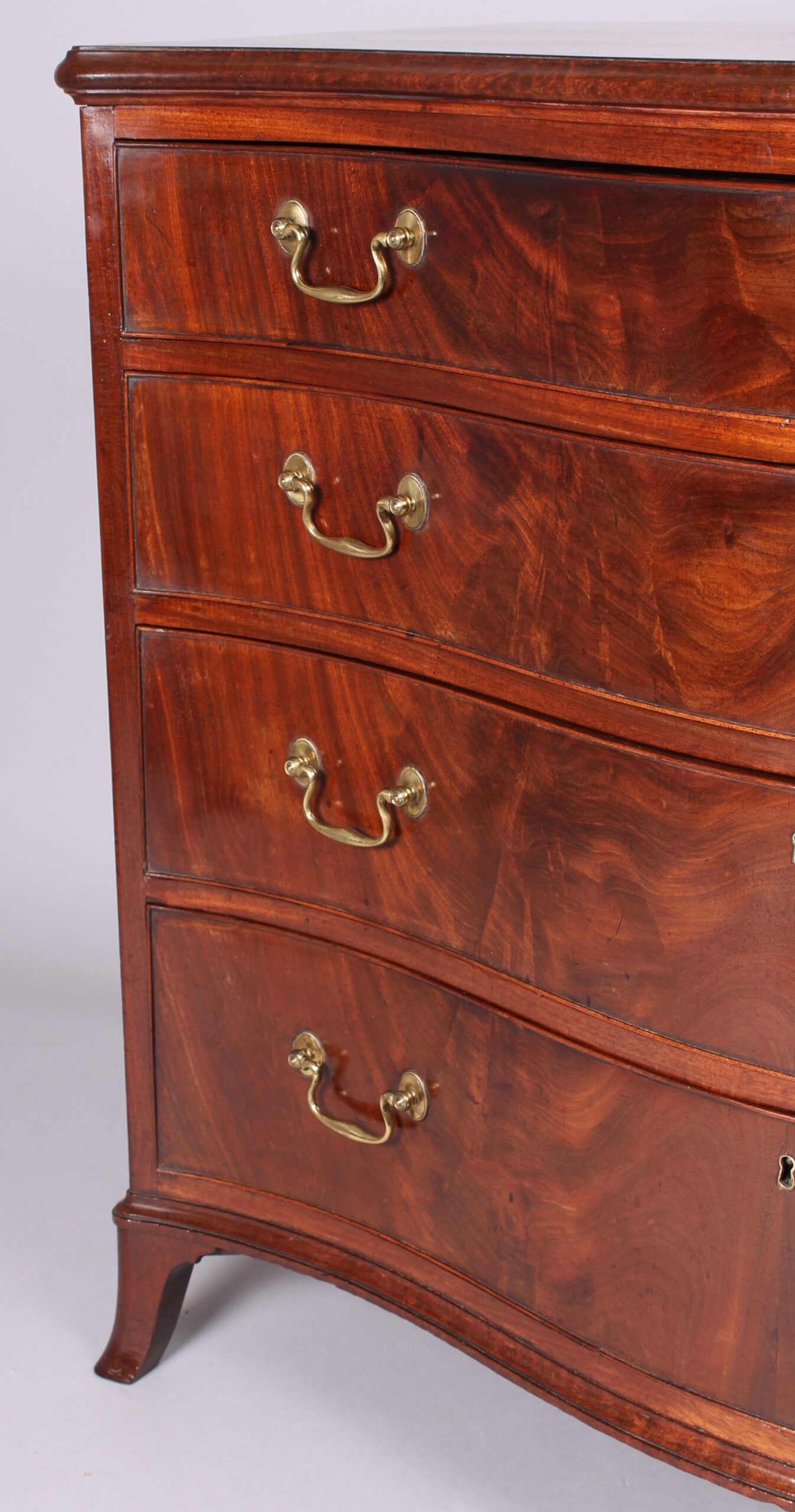 George III period mahogany serpentine-fronted mahogany chest-of-drawers of high quality