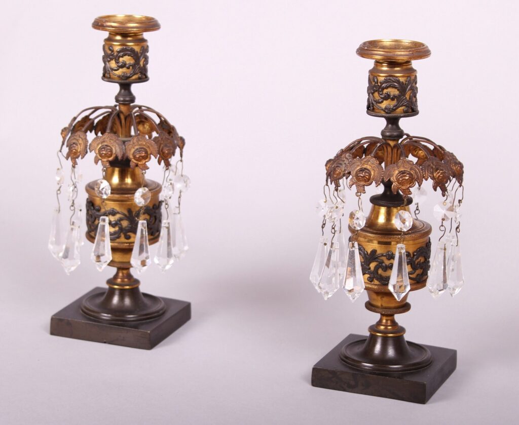 Pair of Regency bronze and ormolu candlesticks