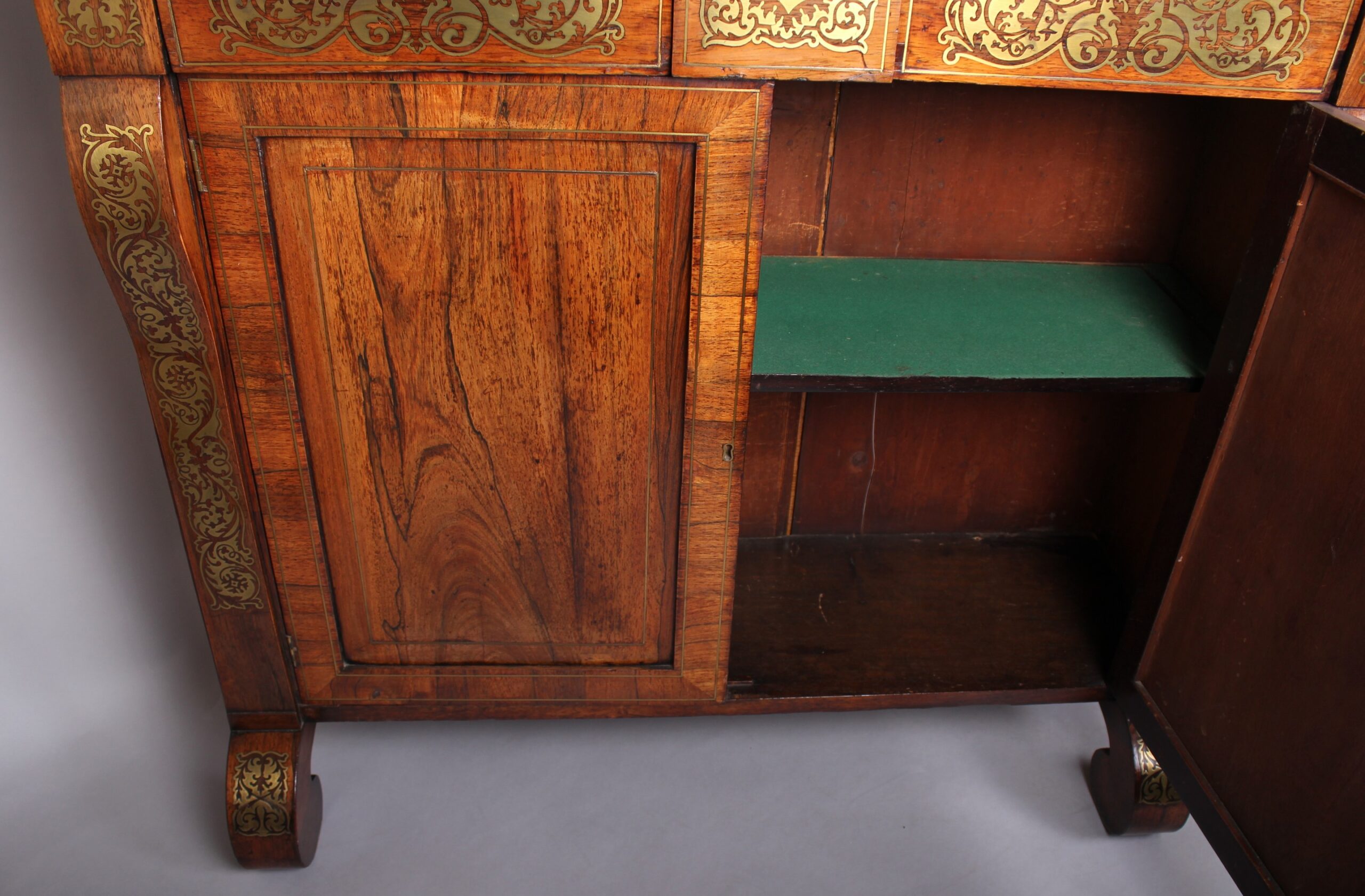 Regency period rosewood and brass inlaid chiffonier