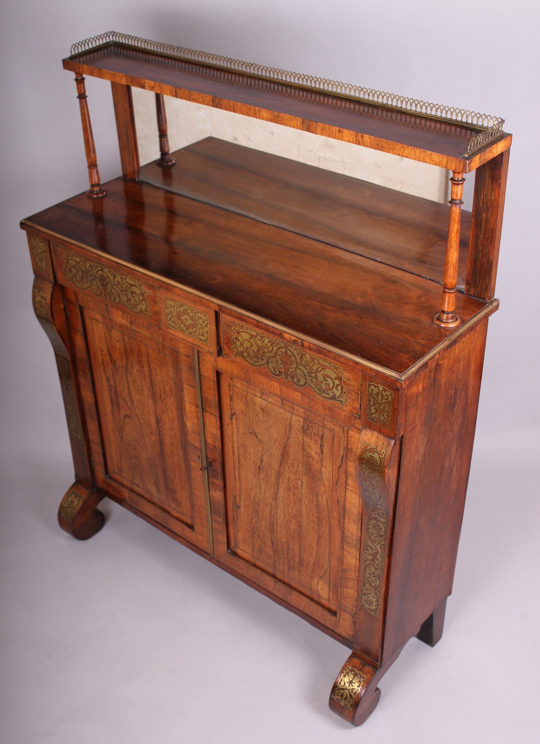 Regency period rosewood and brass inlaid chiffonier