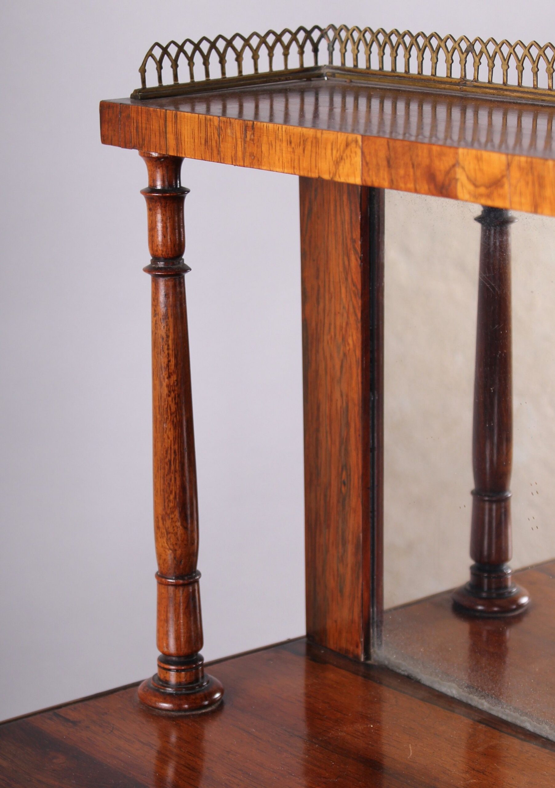 Regency period rosewood and brass inlaid chiffonier