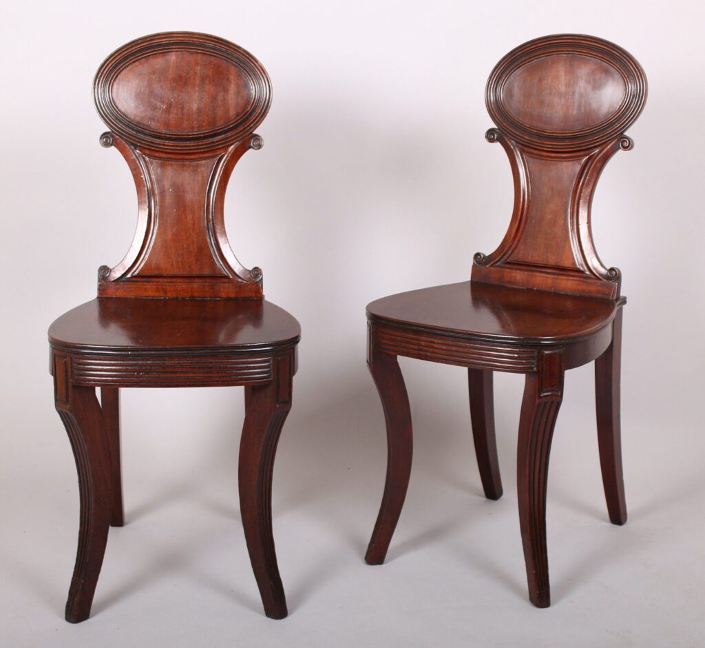 Pair of Regency period mahogany hall-chairs