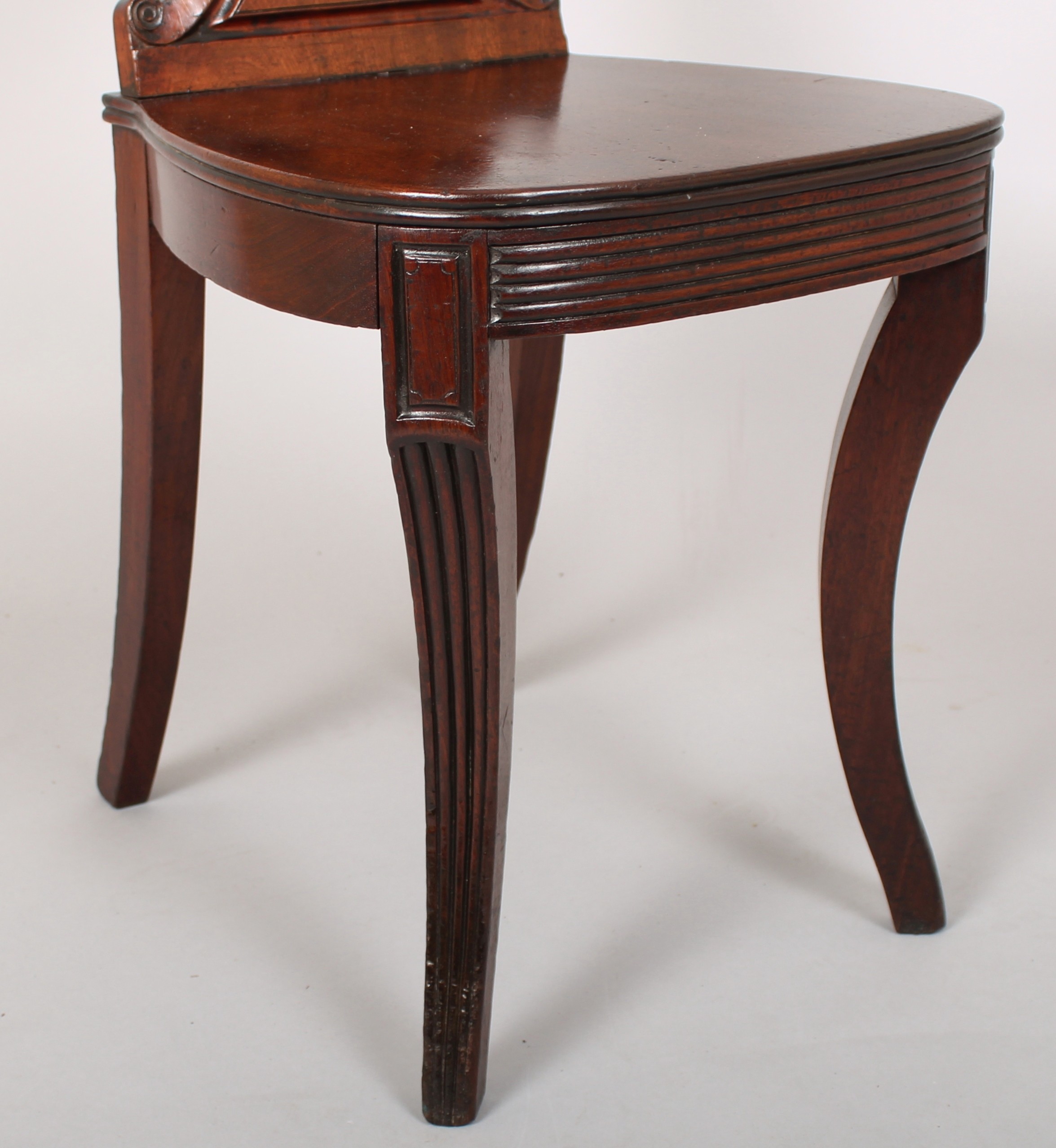 Pair of Regency period mahogany hall-chairs