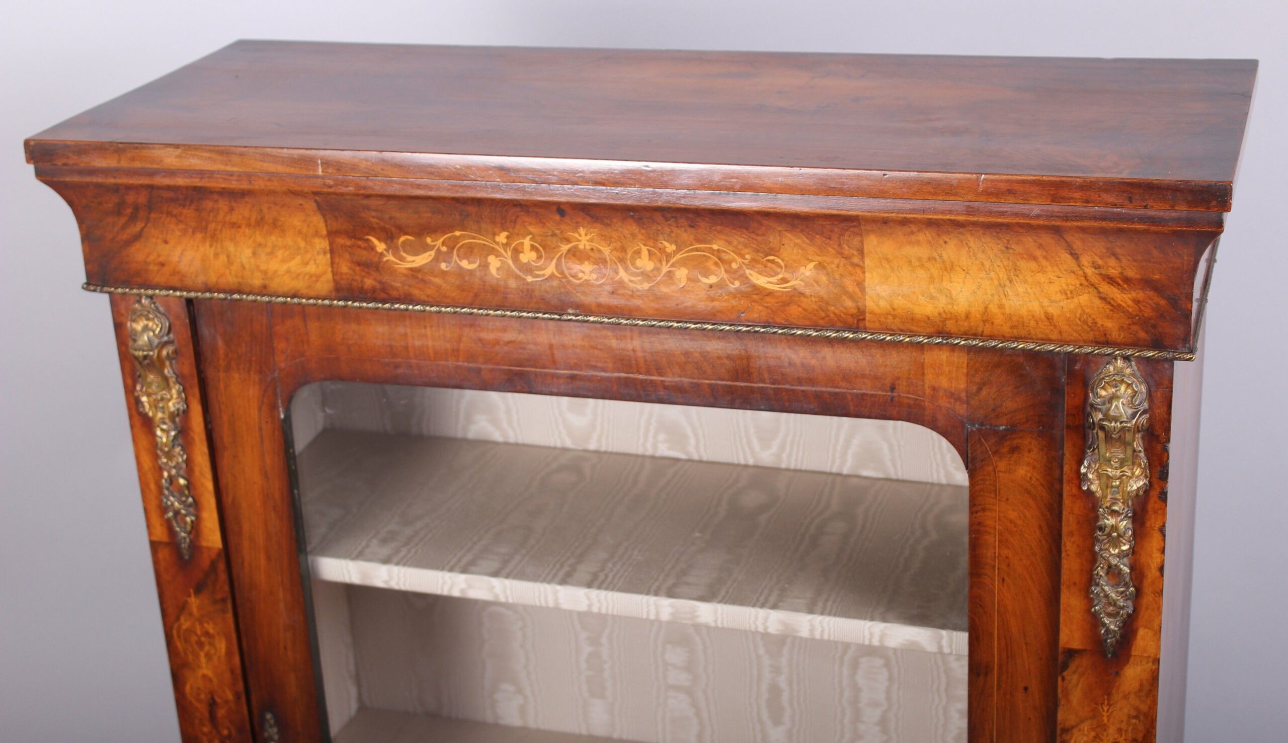 A Victorian walnut side-cabinet