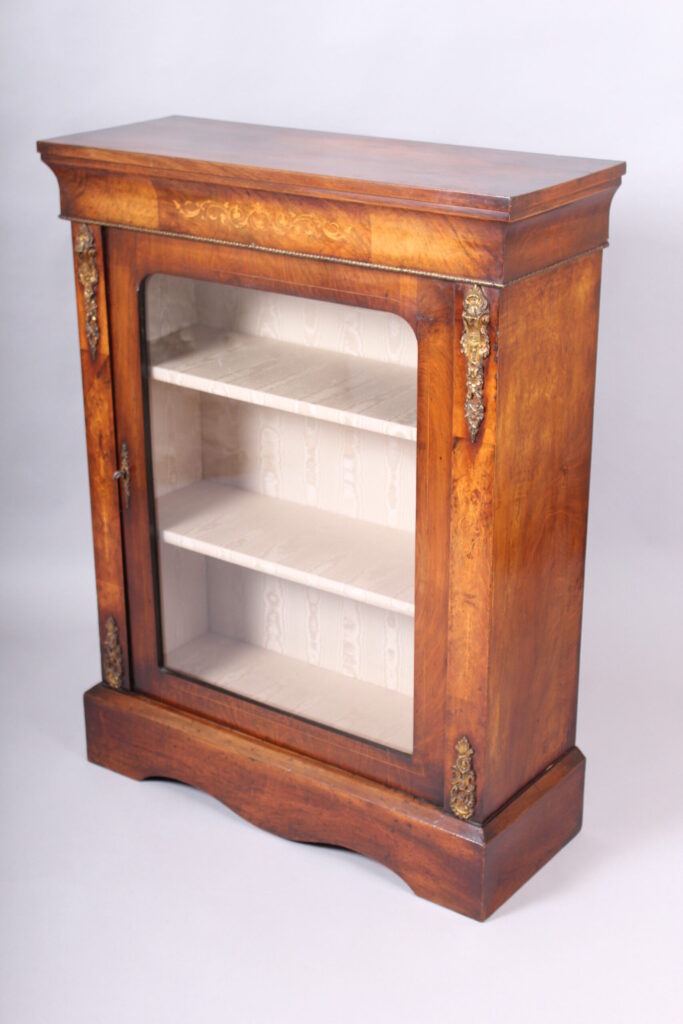 A Victorian walnut side-cabinet