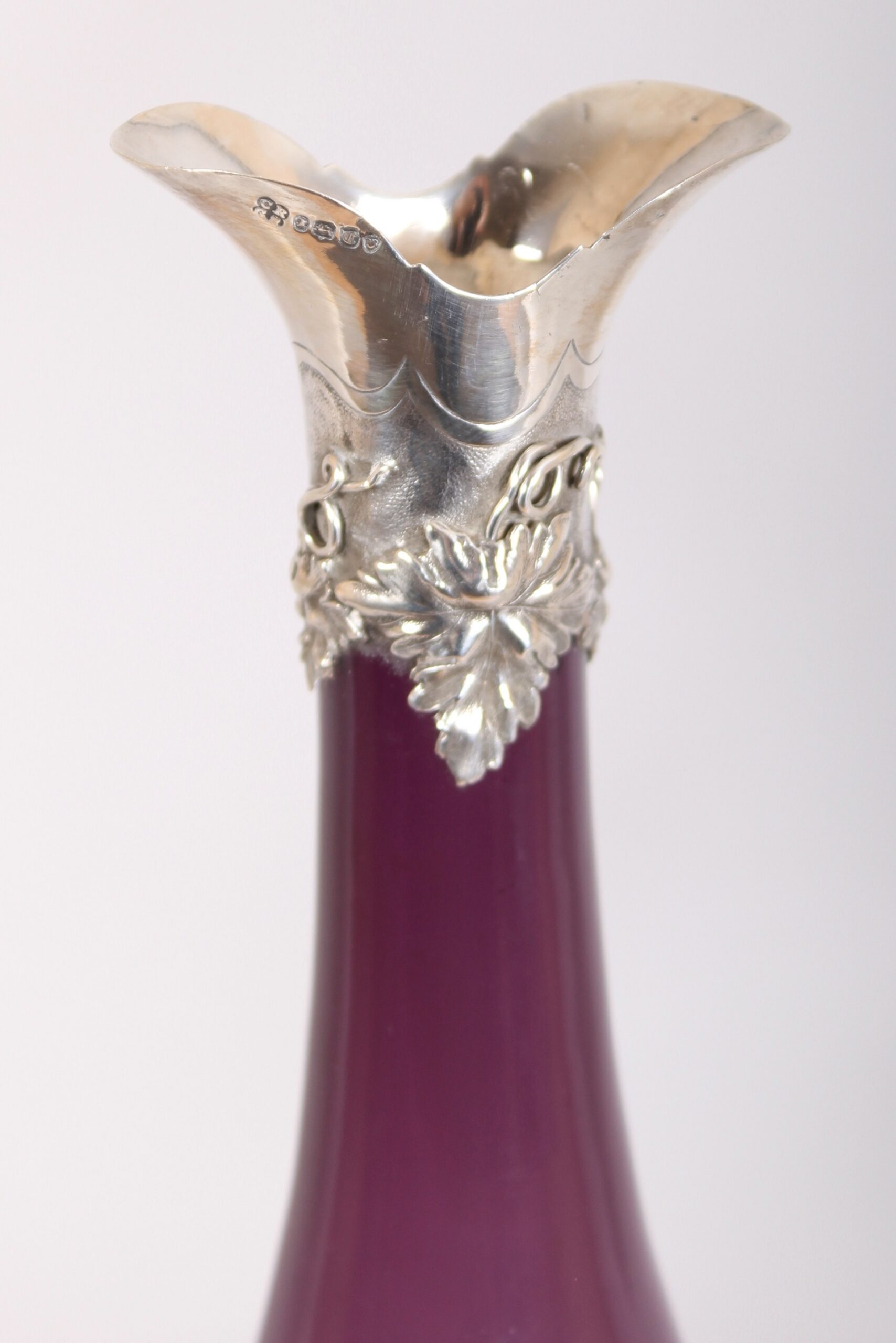Victorian silver-mounted amethyst glass bottle shaped decanter and stopper