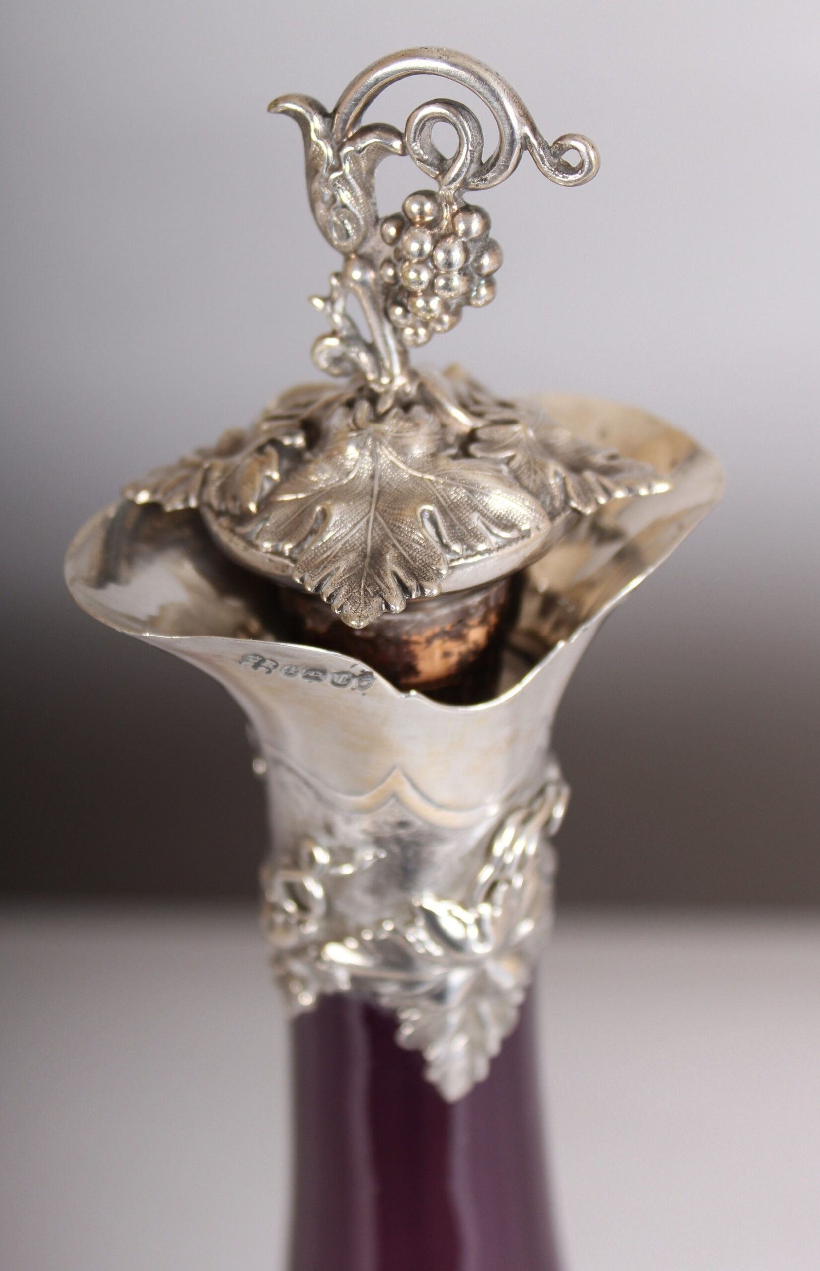 Victorian silver-mounted amethyst glass bottle shaped decanter and stopper