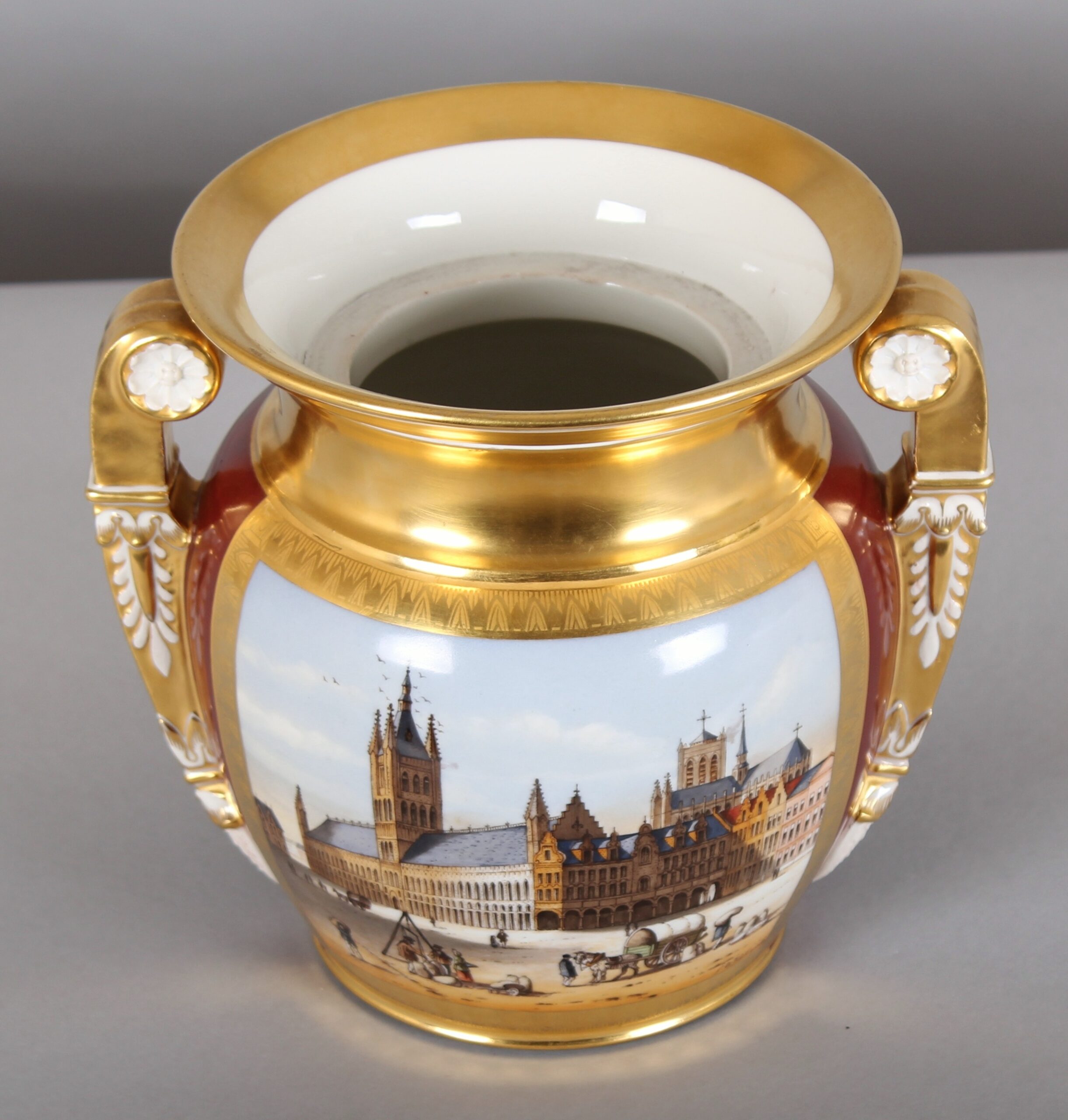 An early 19th century Brussels porcelain vase of Greek form