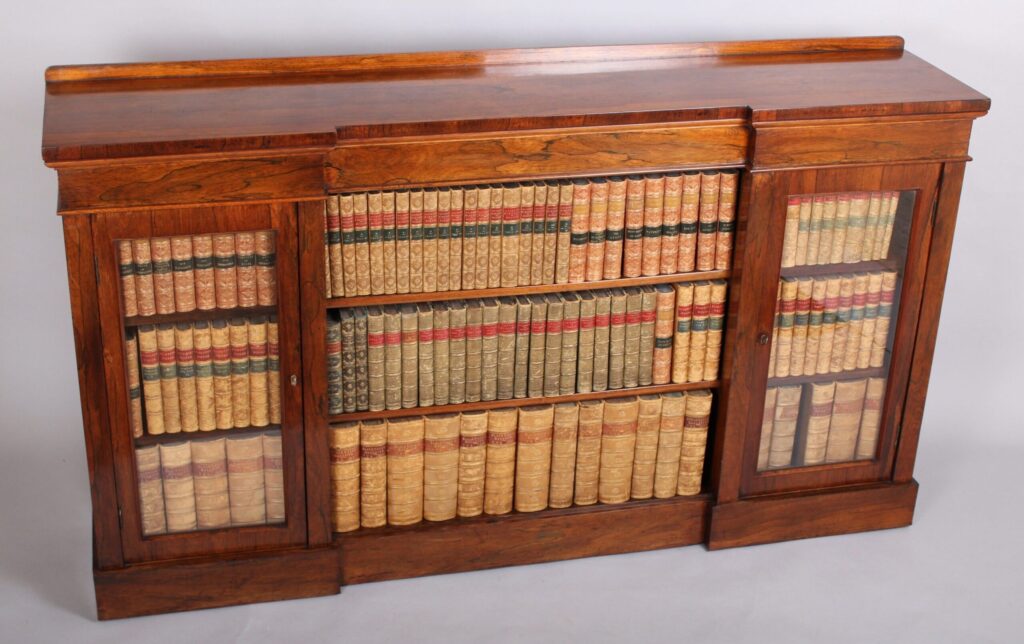 William IV period rosewood inverted-breakfront bookcase/side cabinet