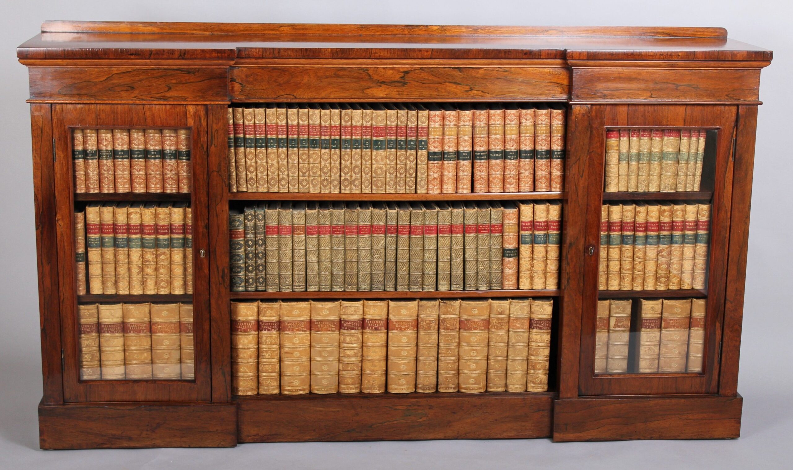 William IV period rosewood inverted-breakfront bookcase/side cabinet