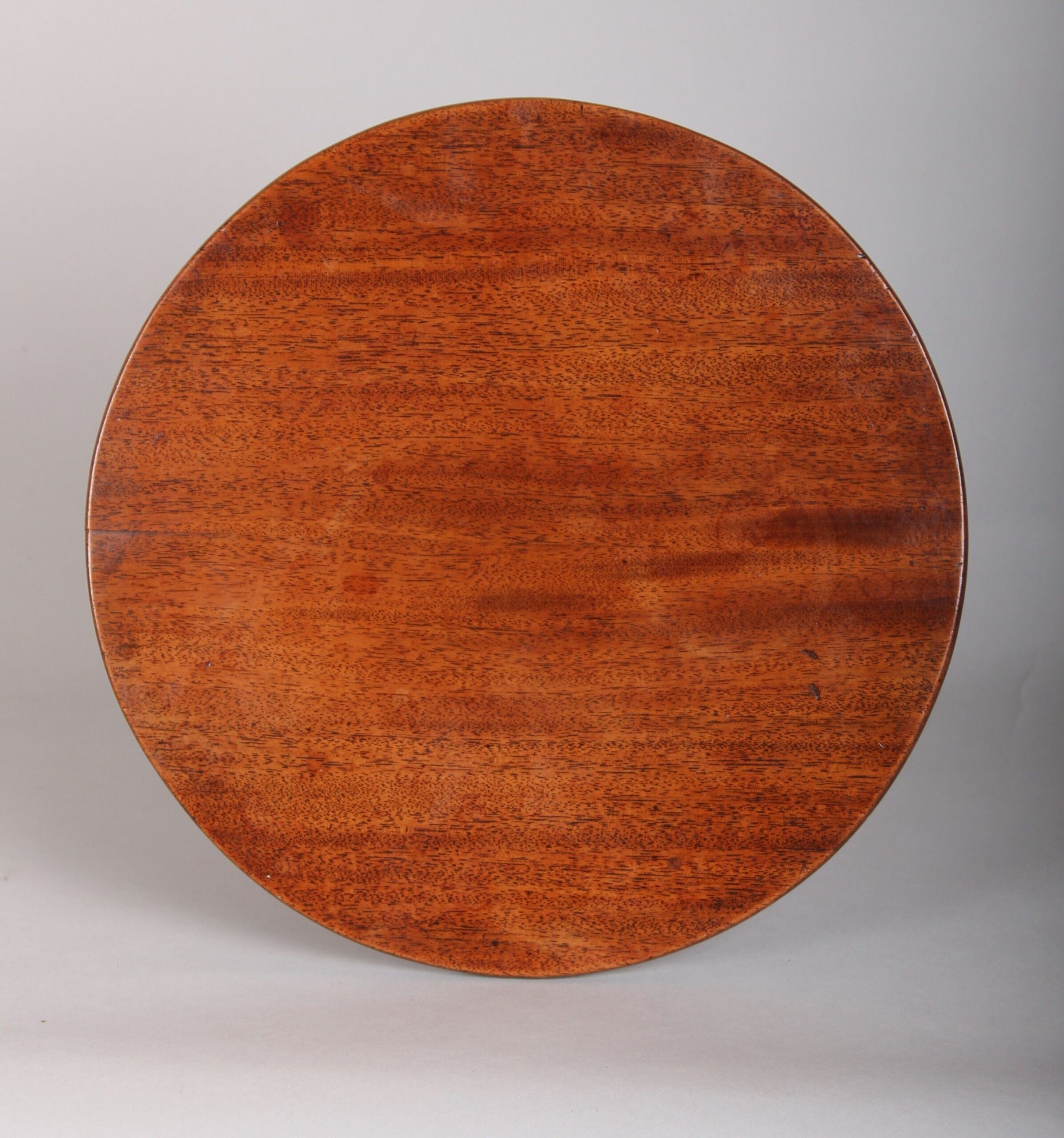 A most unusual George III period miniature mahogany tripod table