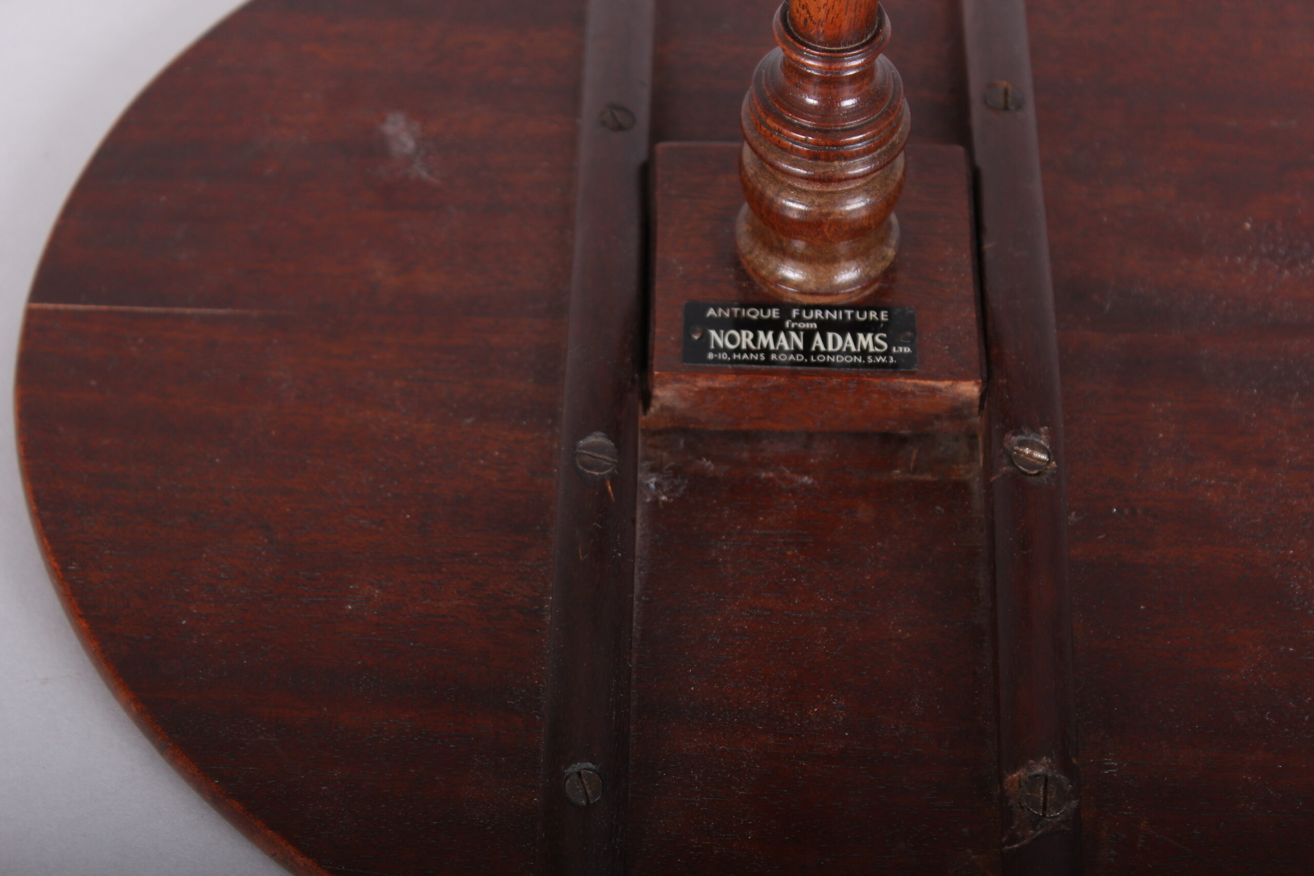 A most unusual George III period miniature mahogany tripod table