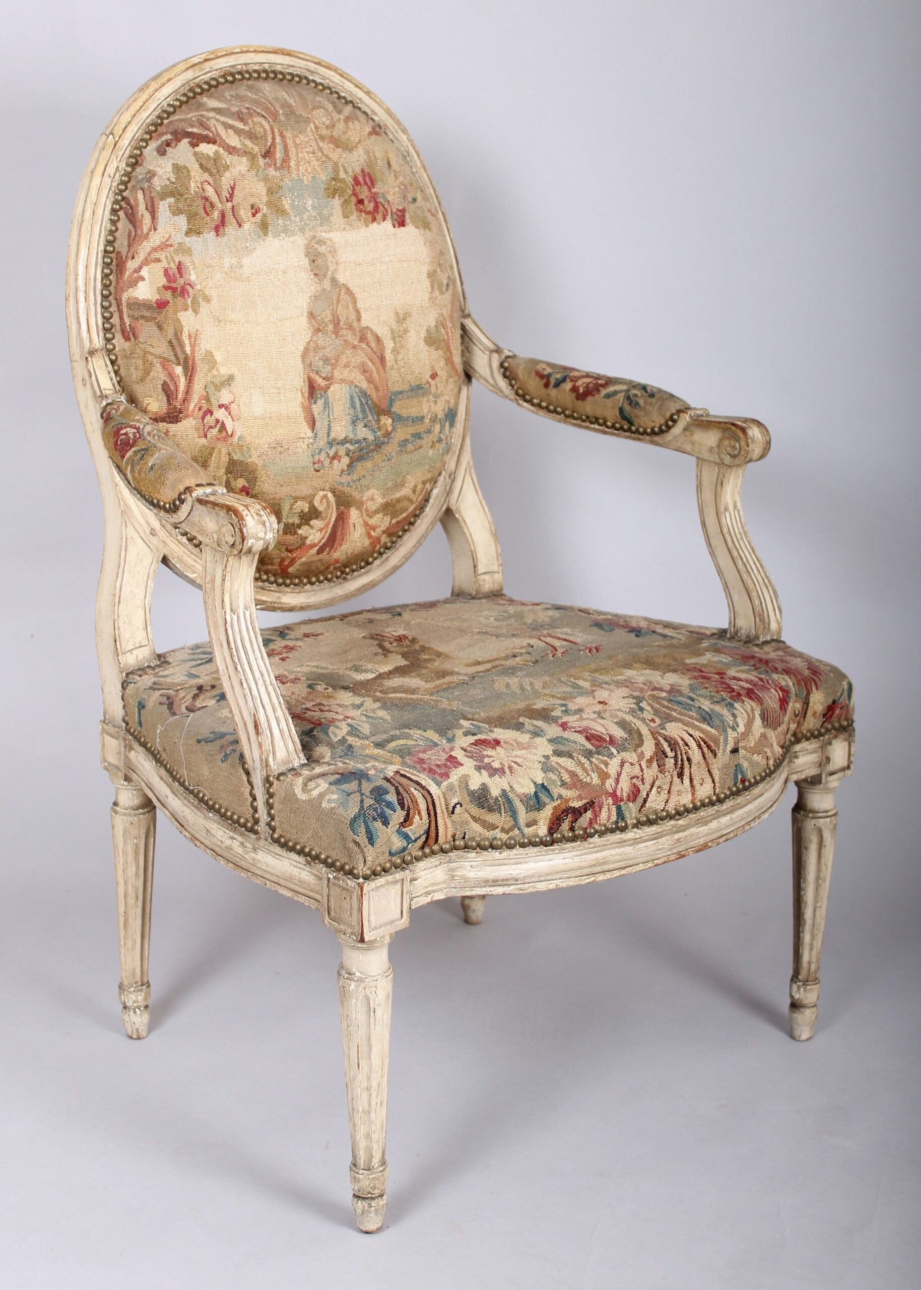 Pair of Louis XVI period white and gold painted fauteuils with Aubusson tapestry covers